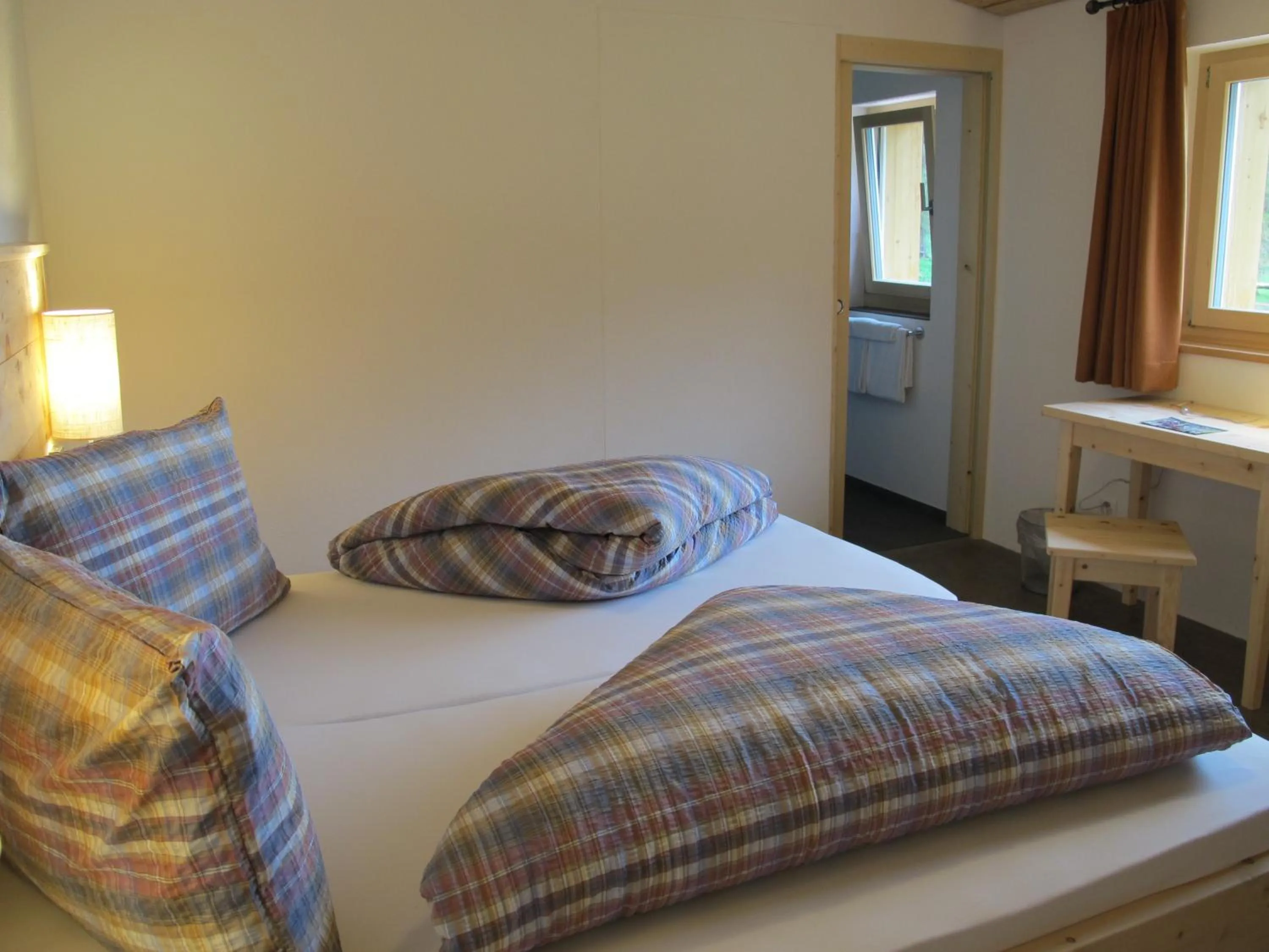 Photo of the whole room, Bed in Reitstall und Saloon San Jon