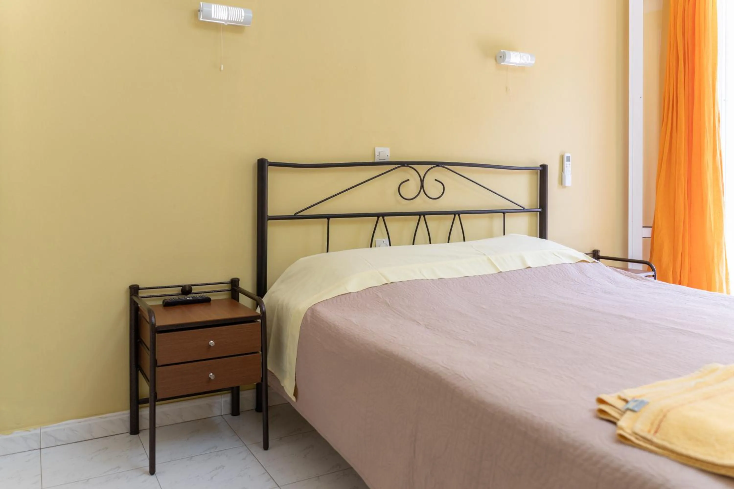 Bed in Remezzo Apartments