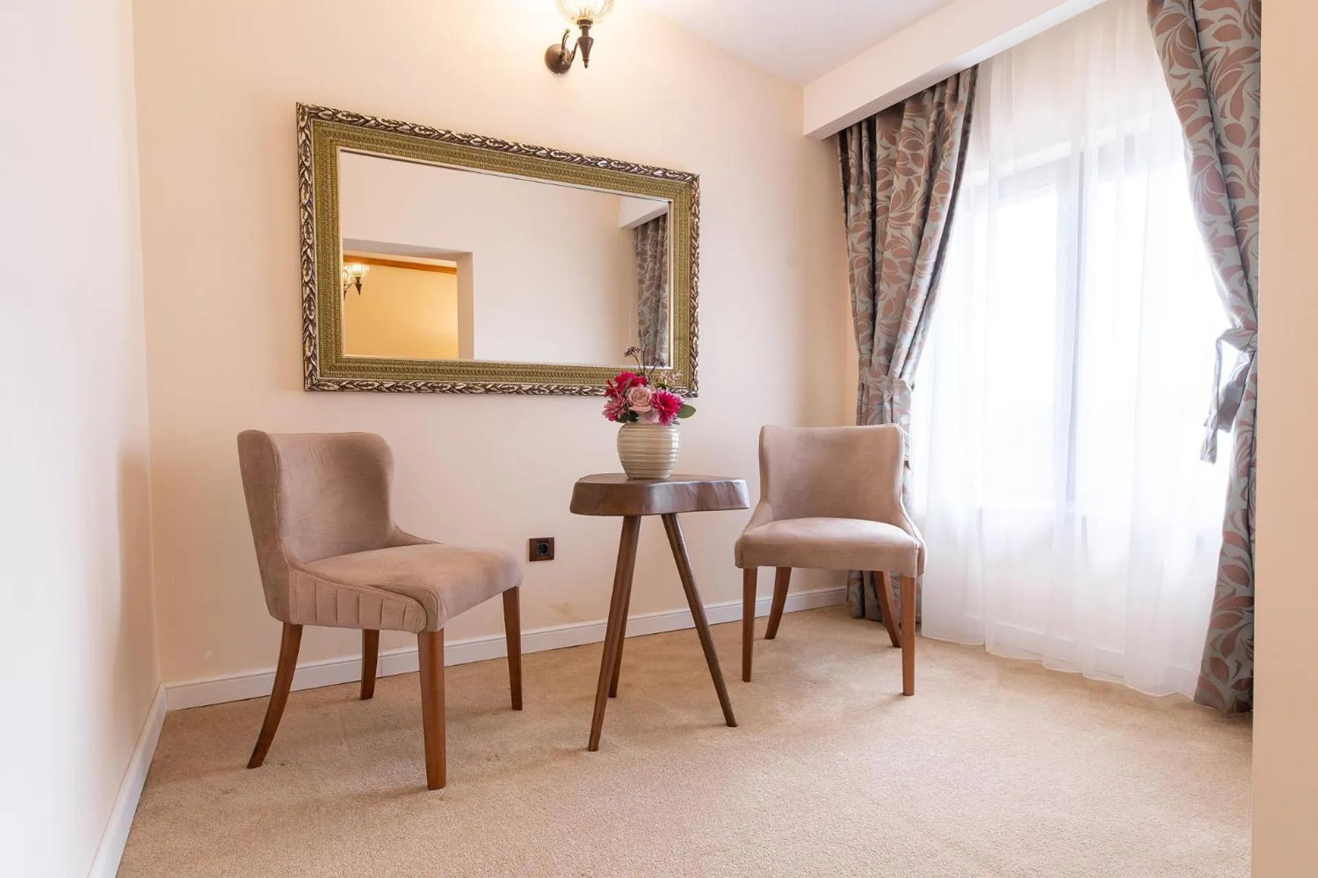 Seating area in RED CONFORT HOTEL Boutique