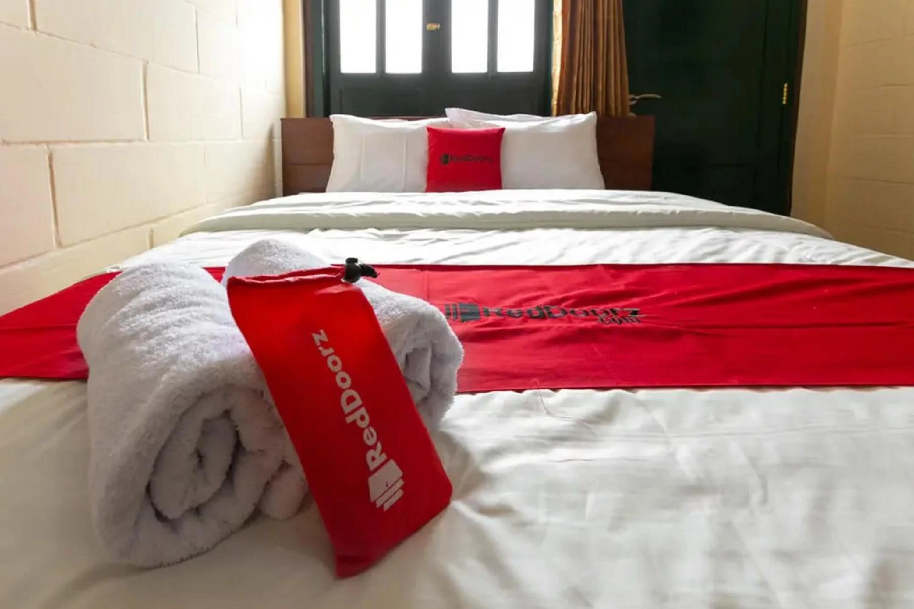 Bed in RedDoorz Syariah near Titik Nol Yogyakarta