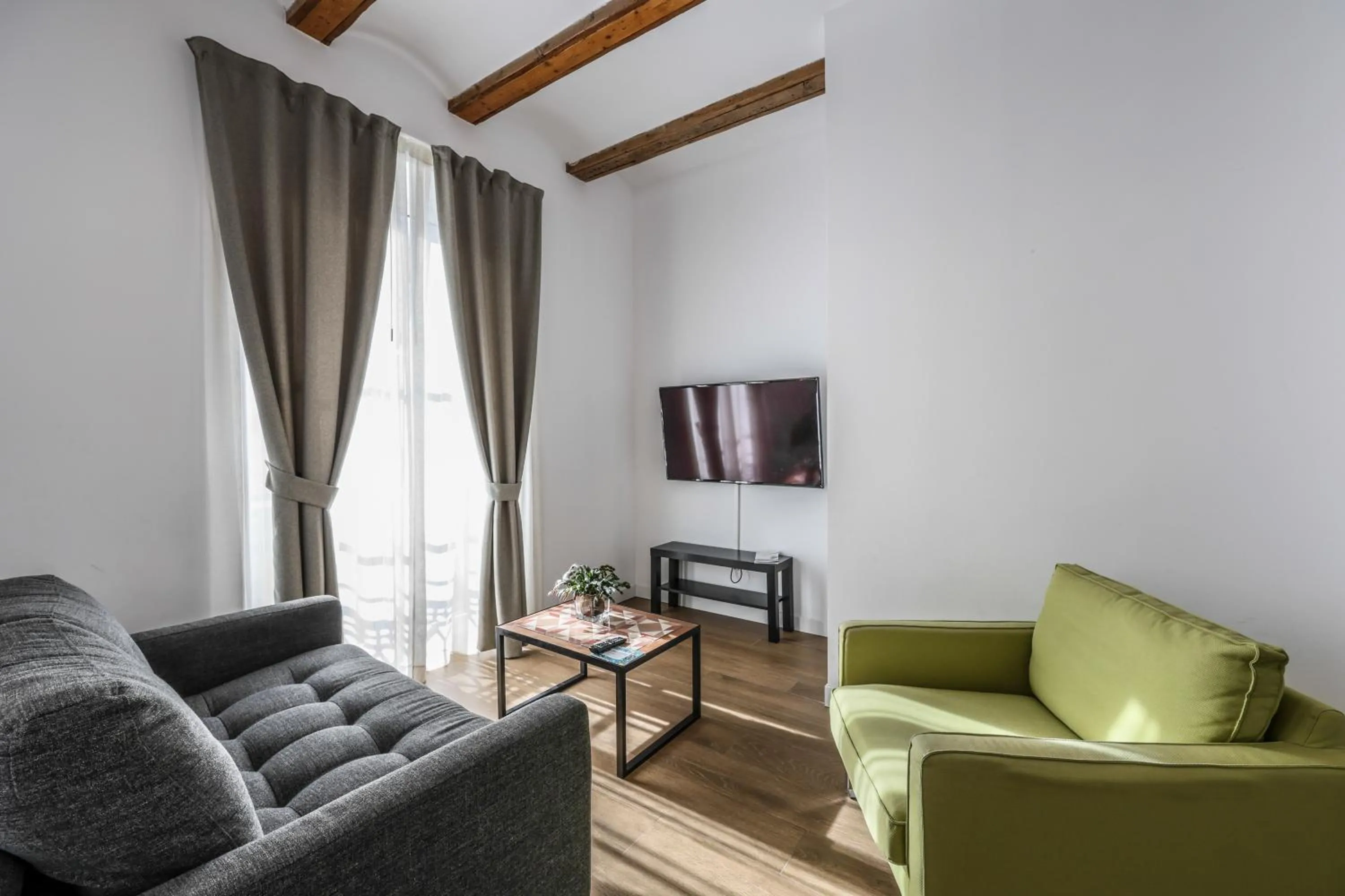 Living room in AmazINN Collection Valencia Centro EVI