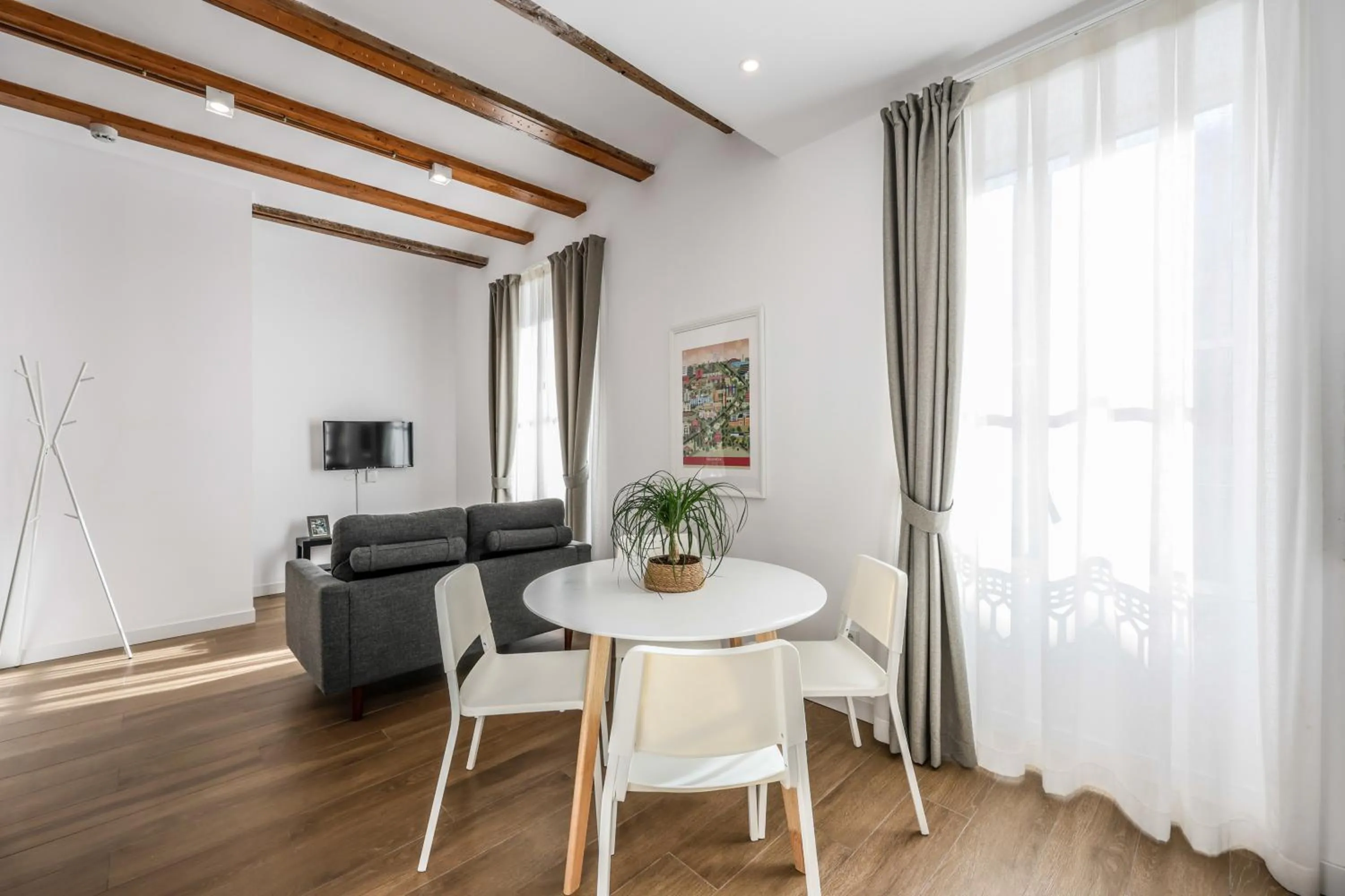 Living room in AmazINN Collection Valencia Centro EVI