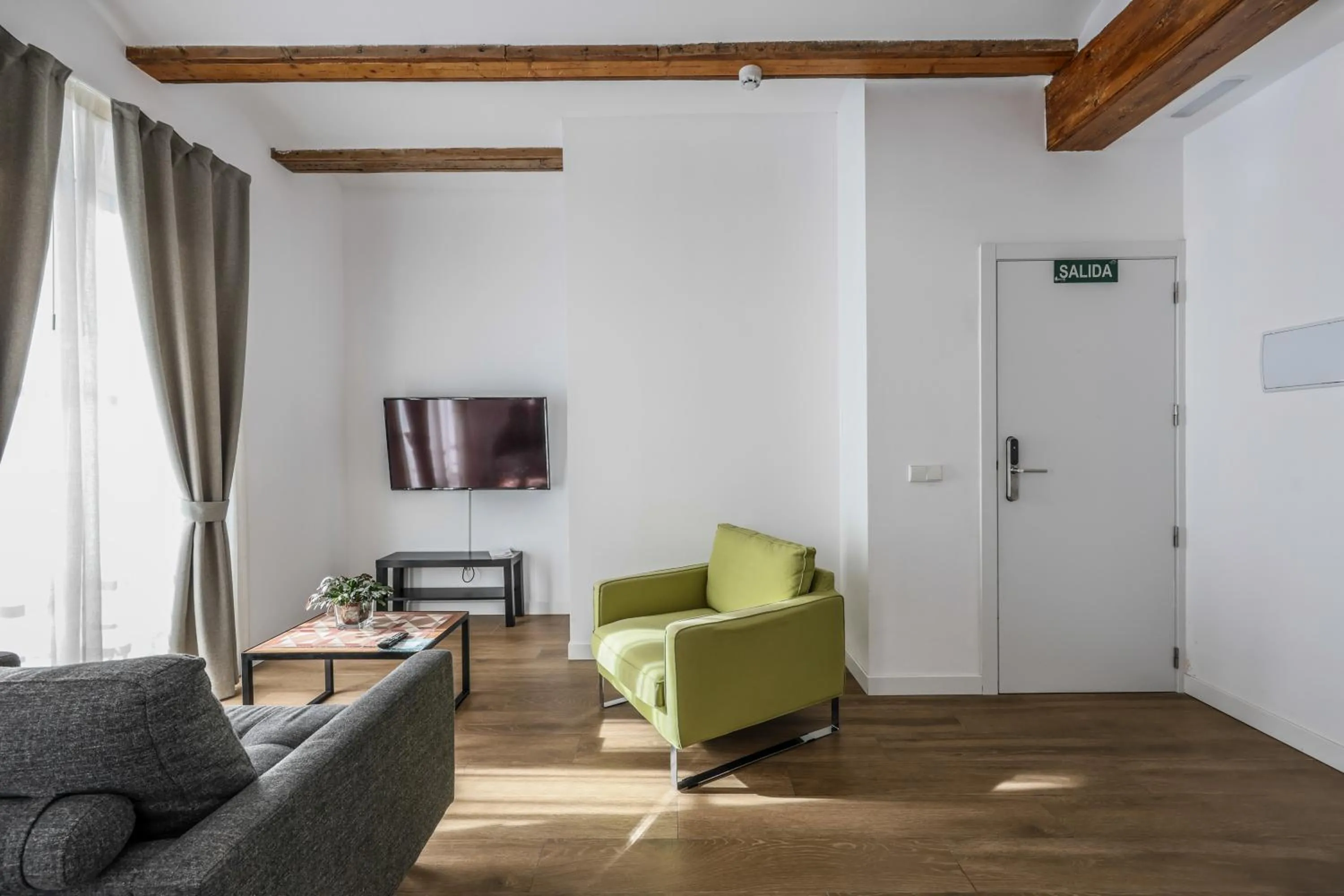 Living room in AmazINN Collection Valencia Centro EVI