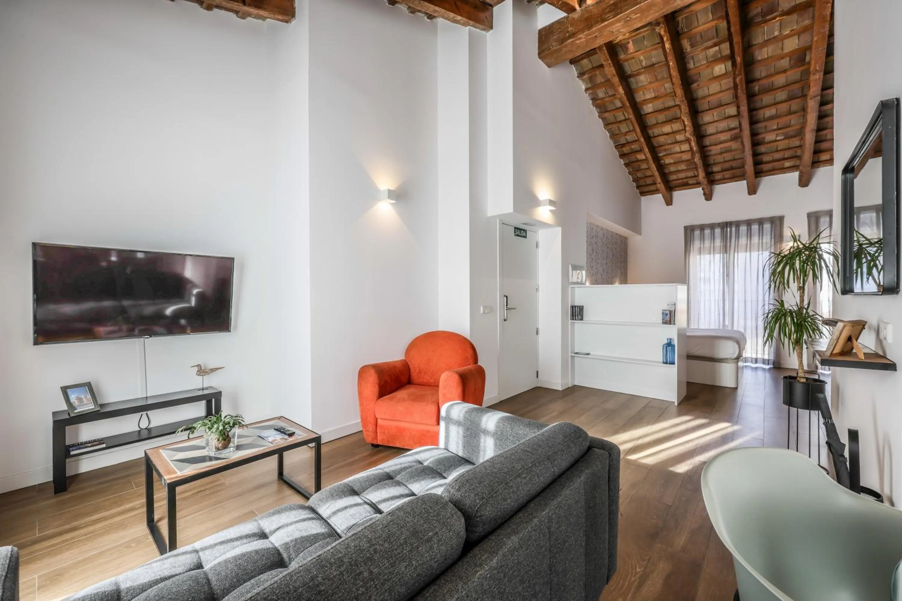 Living room in AmazINN Collection Valencia Centro EVI