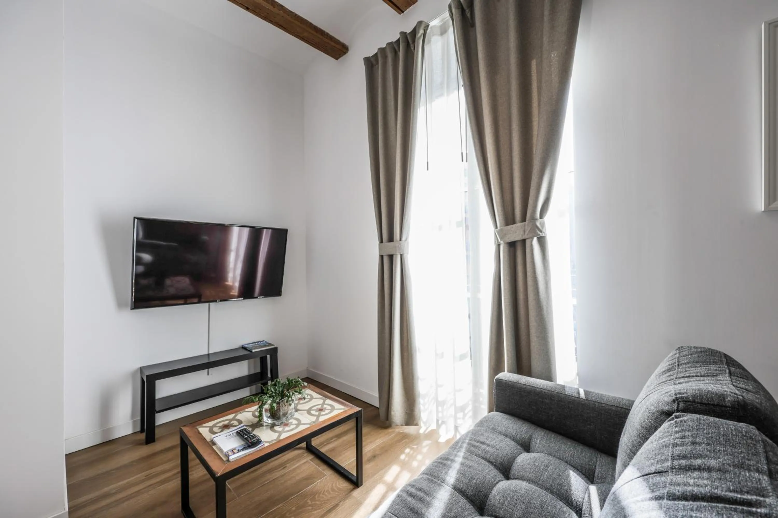 Living room in AmazINN Collection Valencia Centro EVI