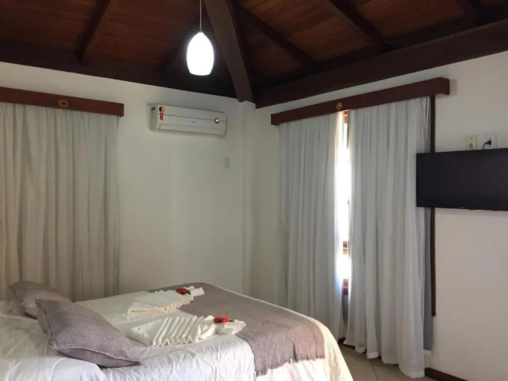 Photo of the whole room, Bed in Eden Praia Hotel