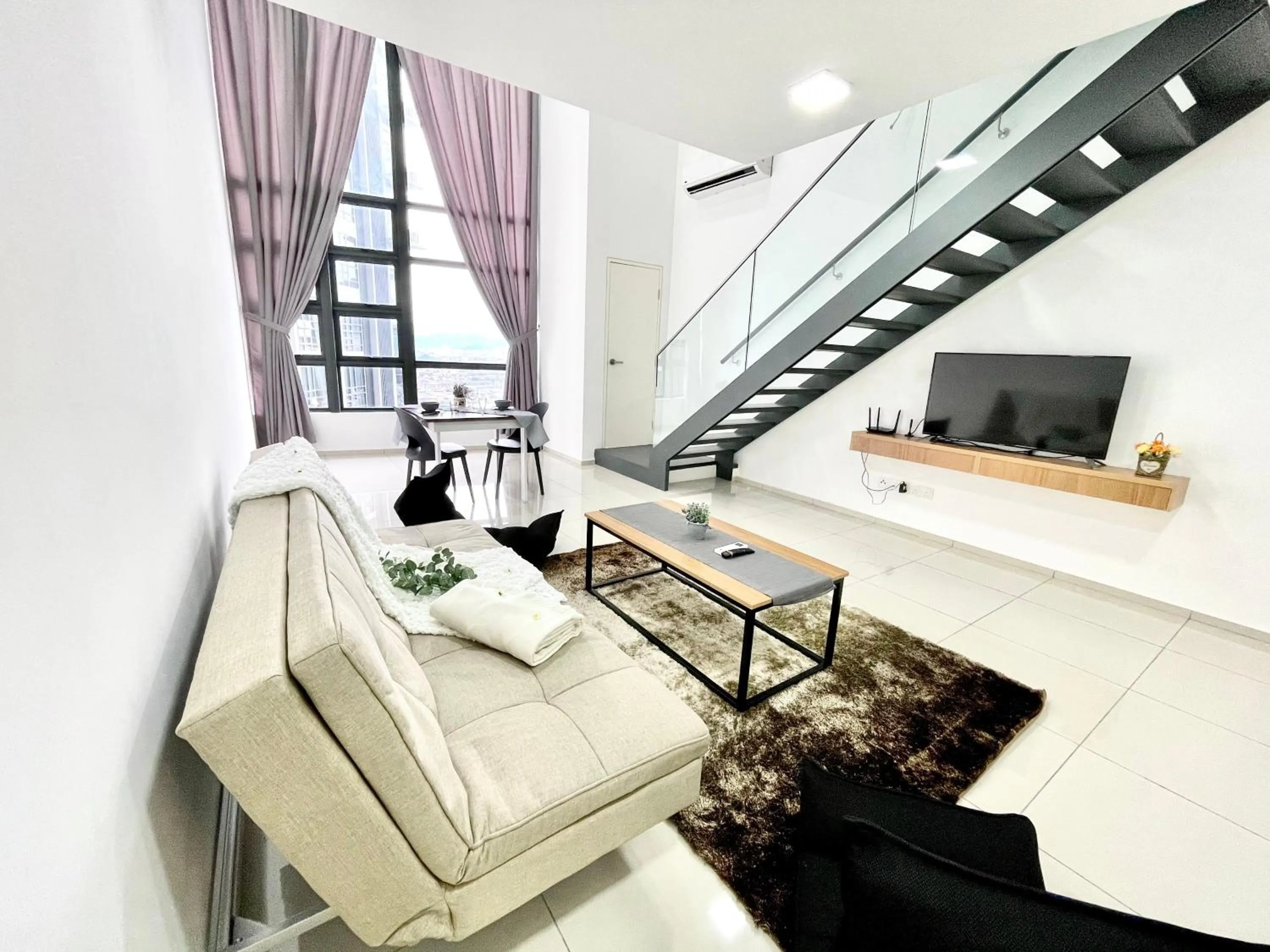 Living room in Ekocheras Suite by MOKA at CHERAS