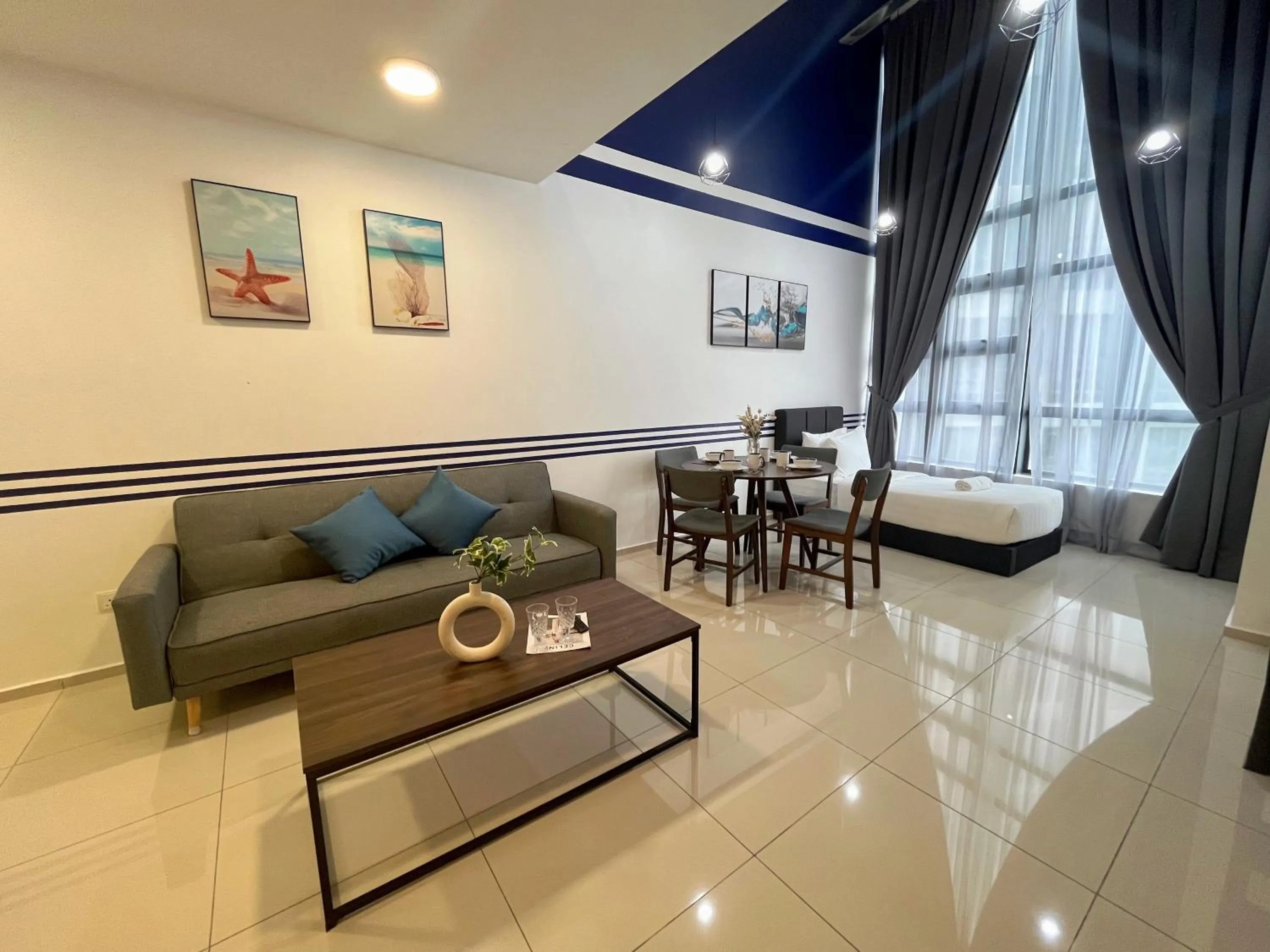 Living room, Bed in Ekocheras Suite by MOKA at CHERAS