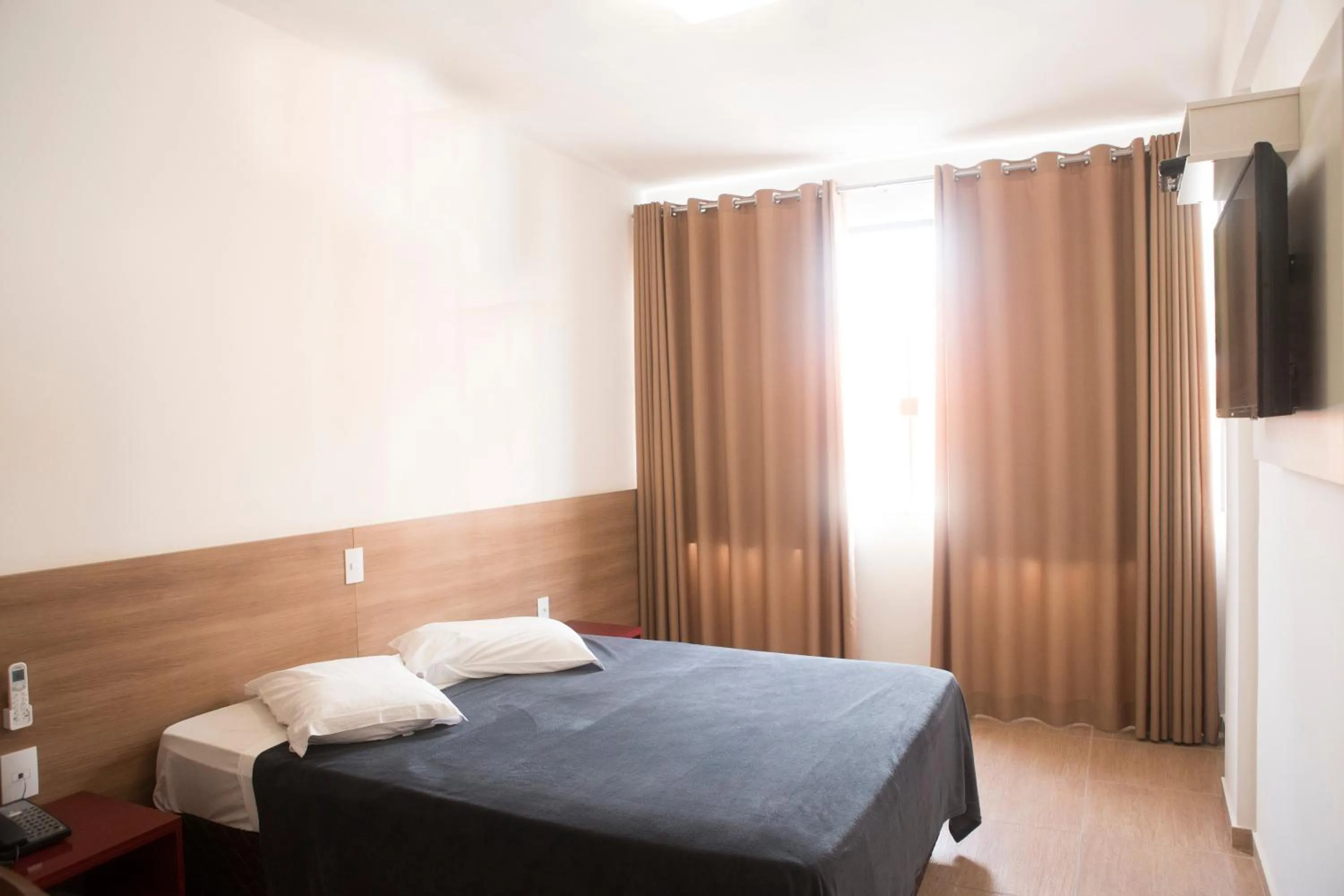 Bed in Grand Enio Hotel e Cantina