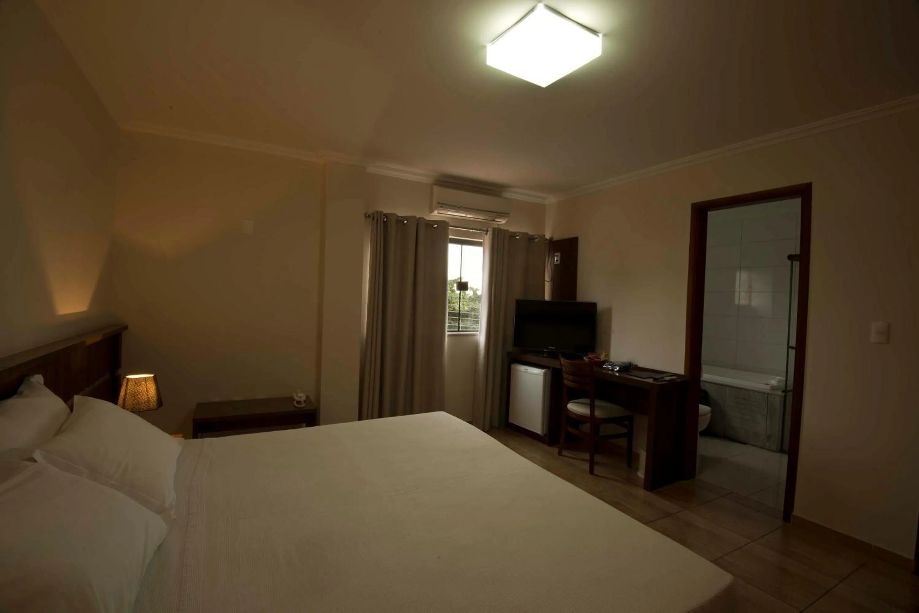 Photo of the whole room, Bed in Grand Enio Hotel e Cantina