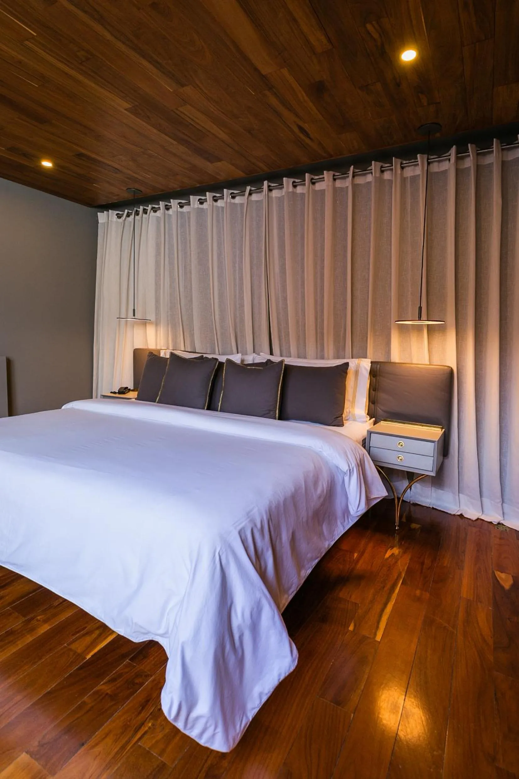 Bed in Dos Casas Hotel & Spa