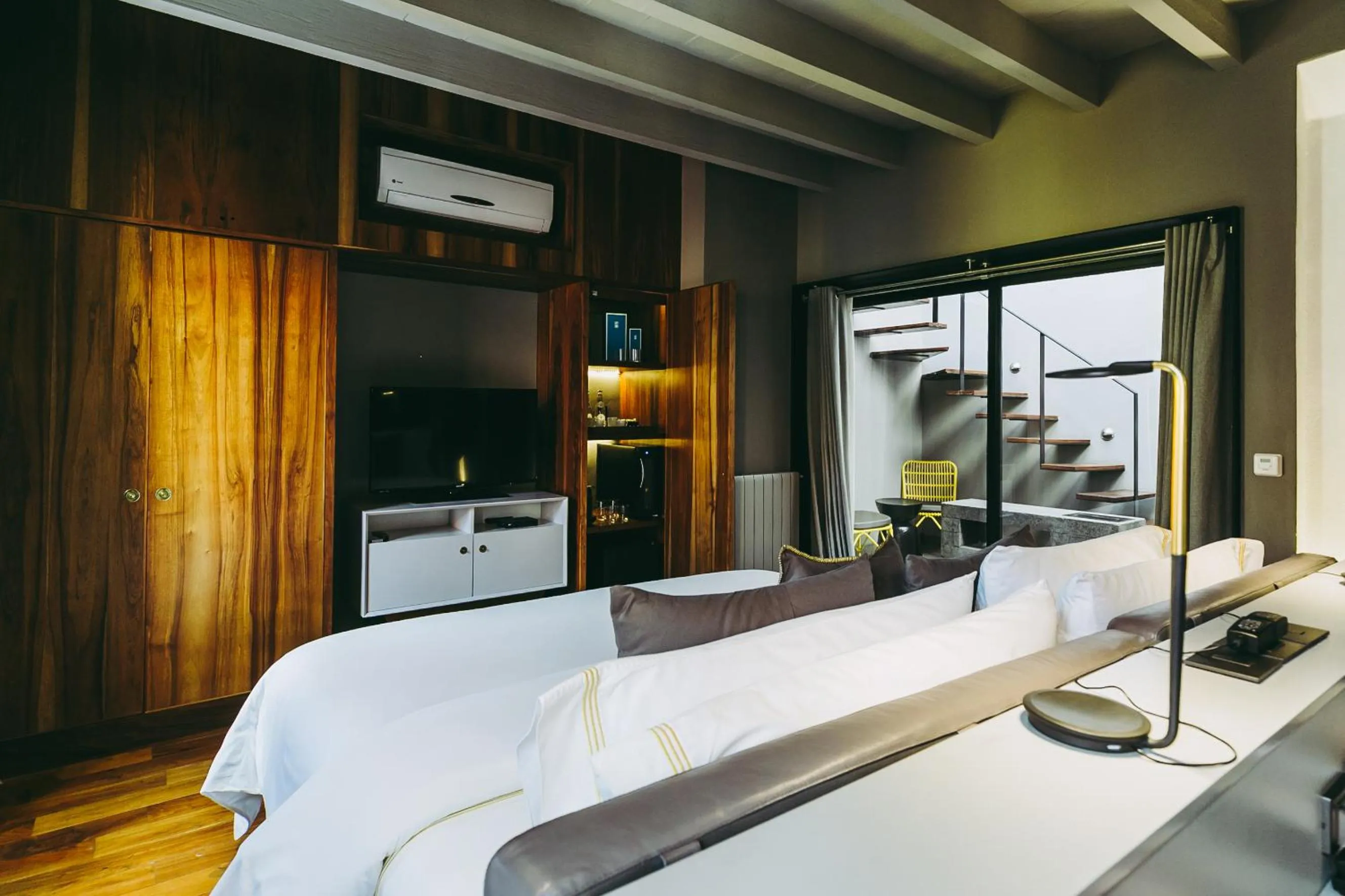 Bed in Dos Casas Hotel & Spa