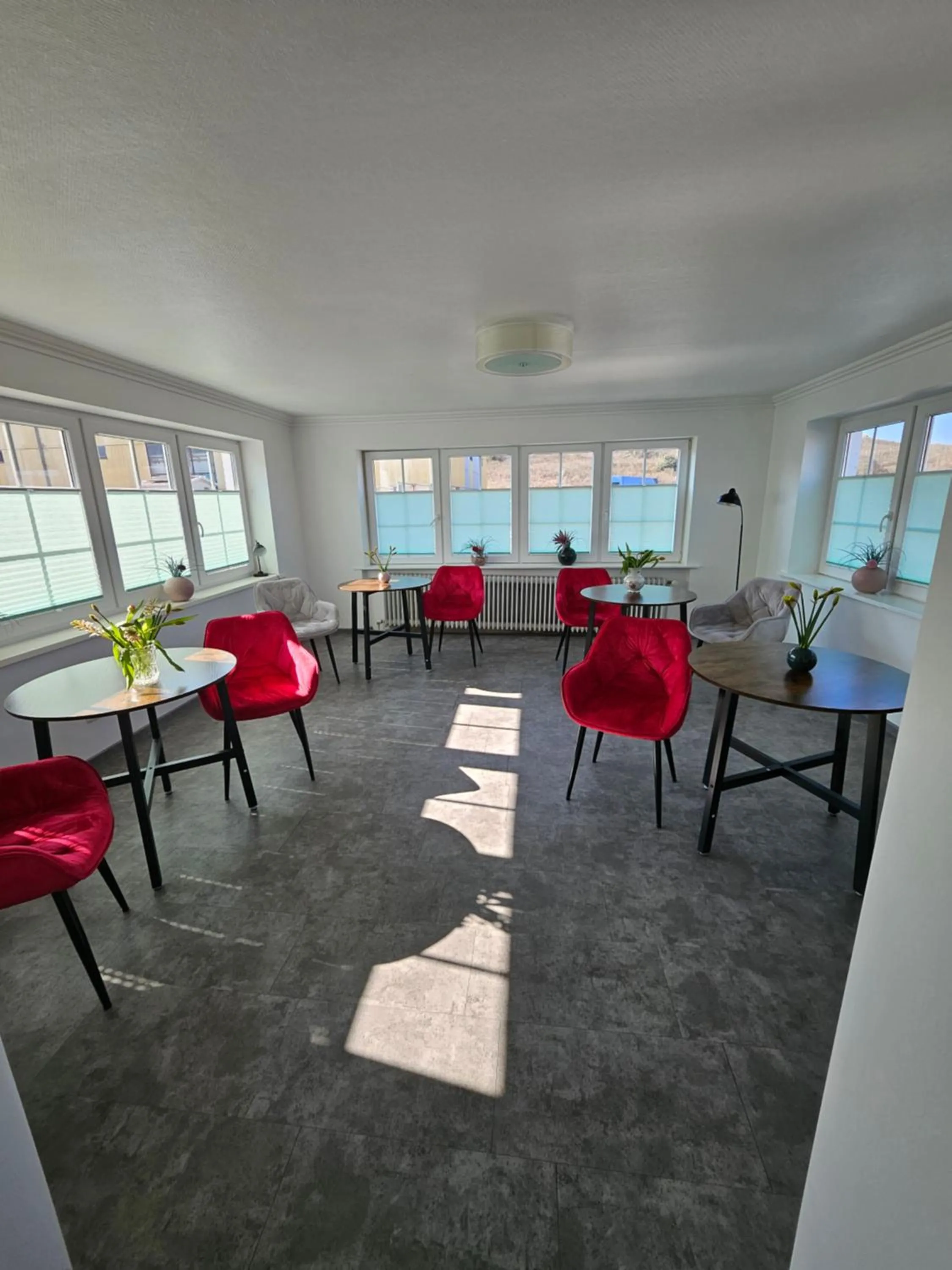Communal lounge/ TV room in Villa am Meer