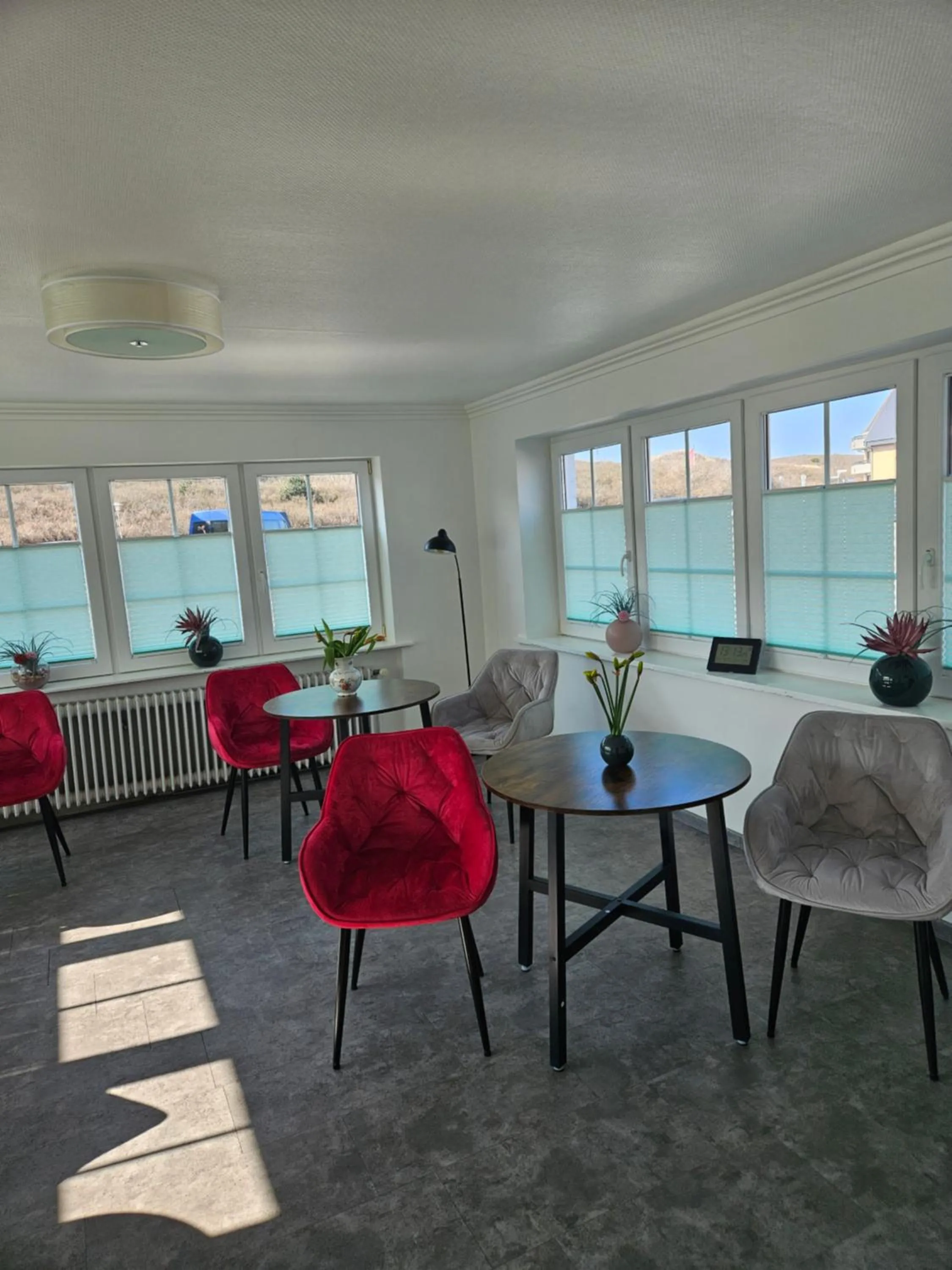 Communal lounge/ TV room in Villa am Meer