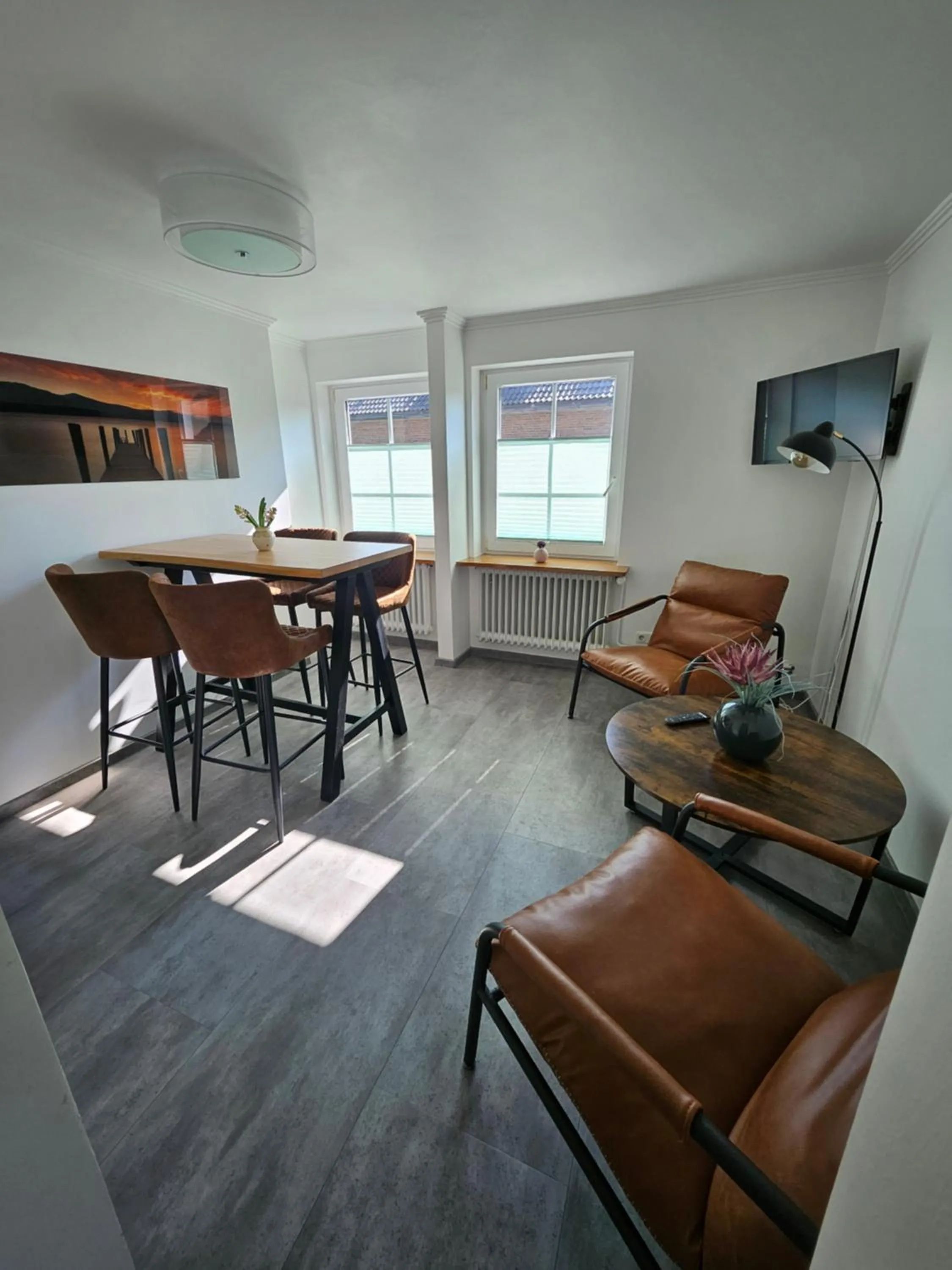 Communal lounge/ TV room in Villa am Meer