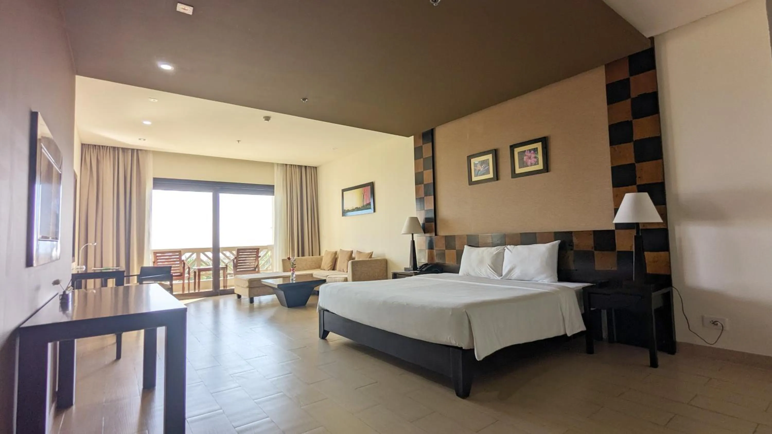 Bed in Olalani Resort & Condotel