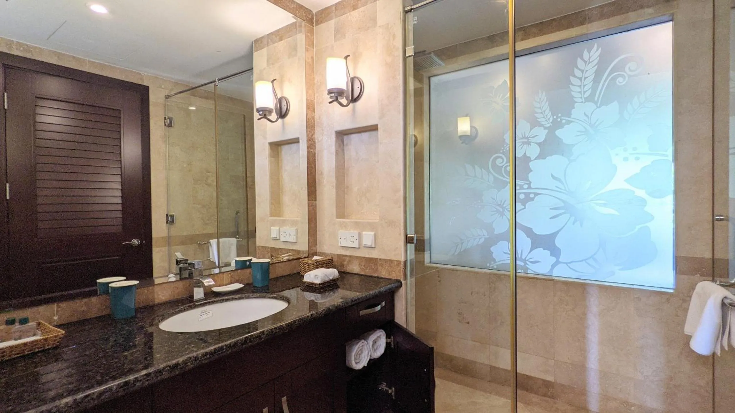 Shower in Olalani Resort & Condotel