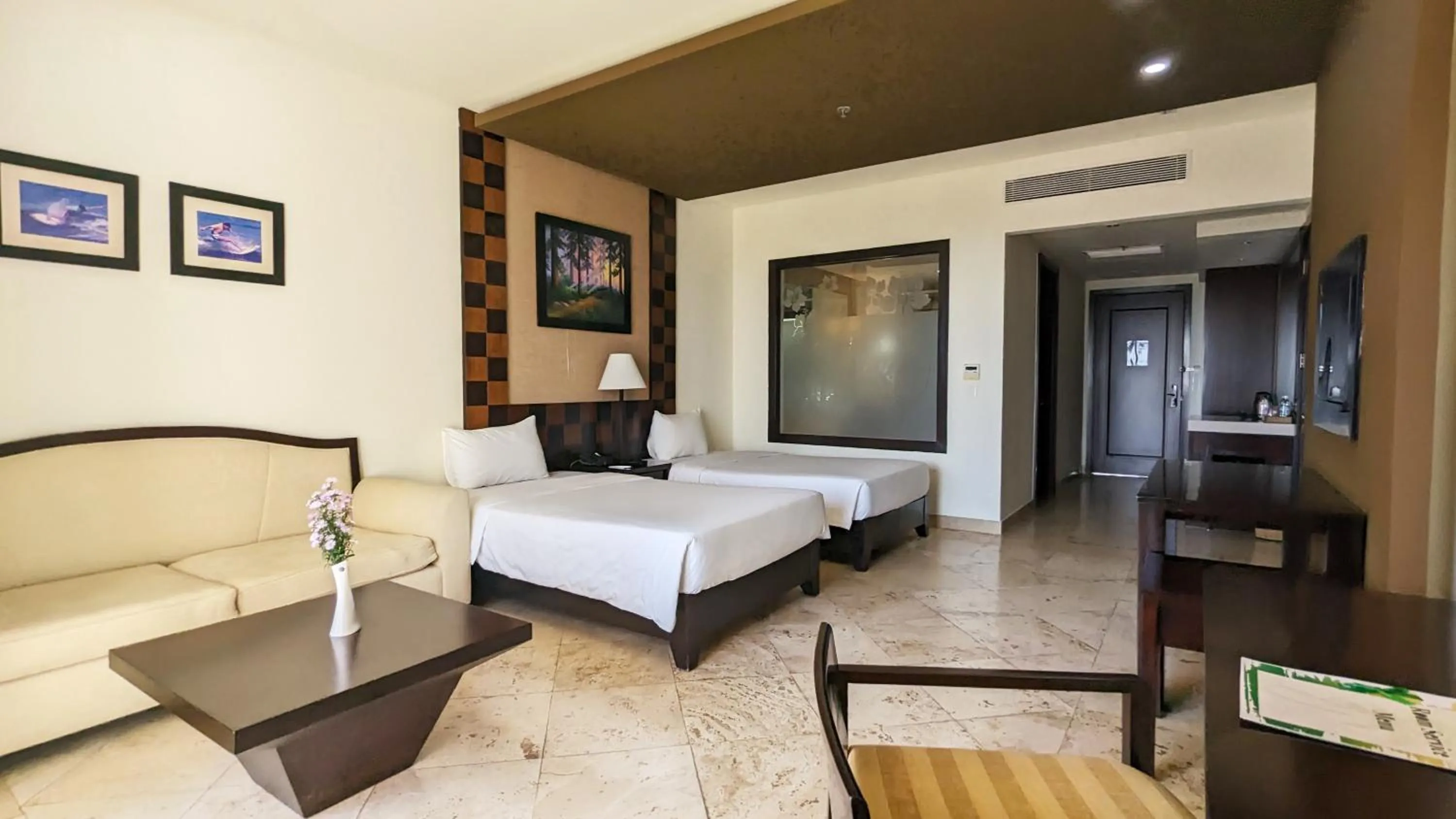 Bed in Olalani Resort & Condotel