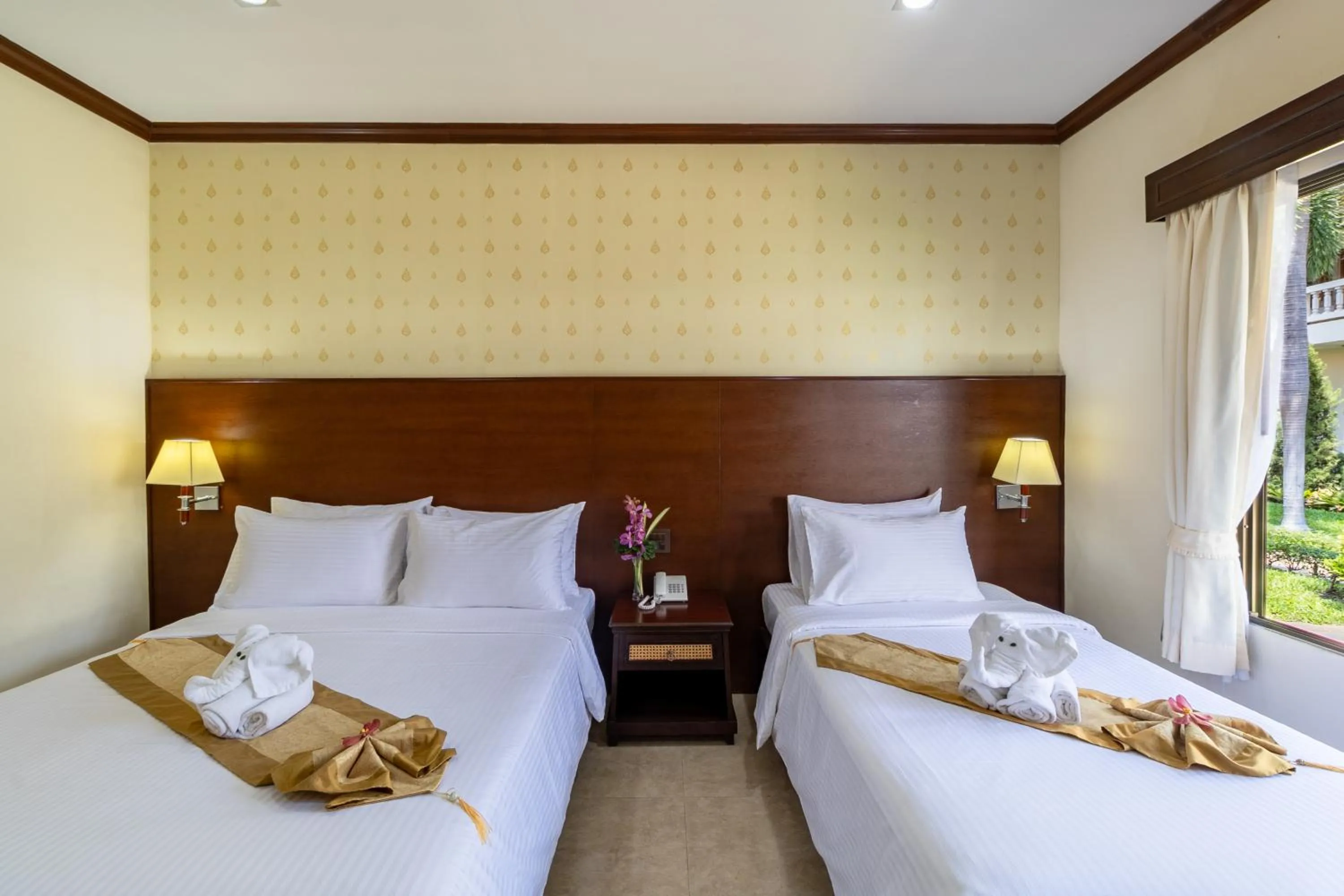 Bed in Thai Garden Resort