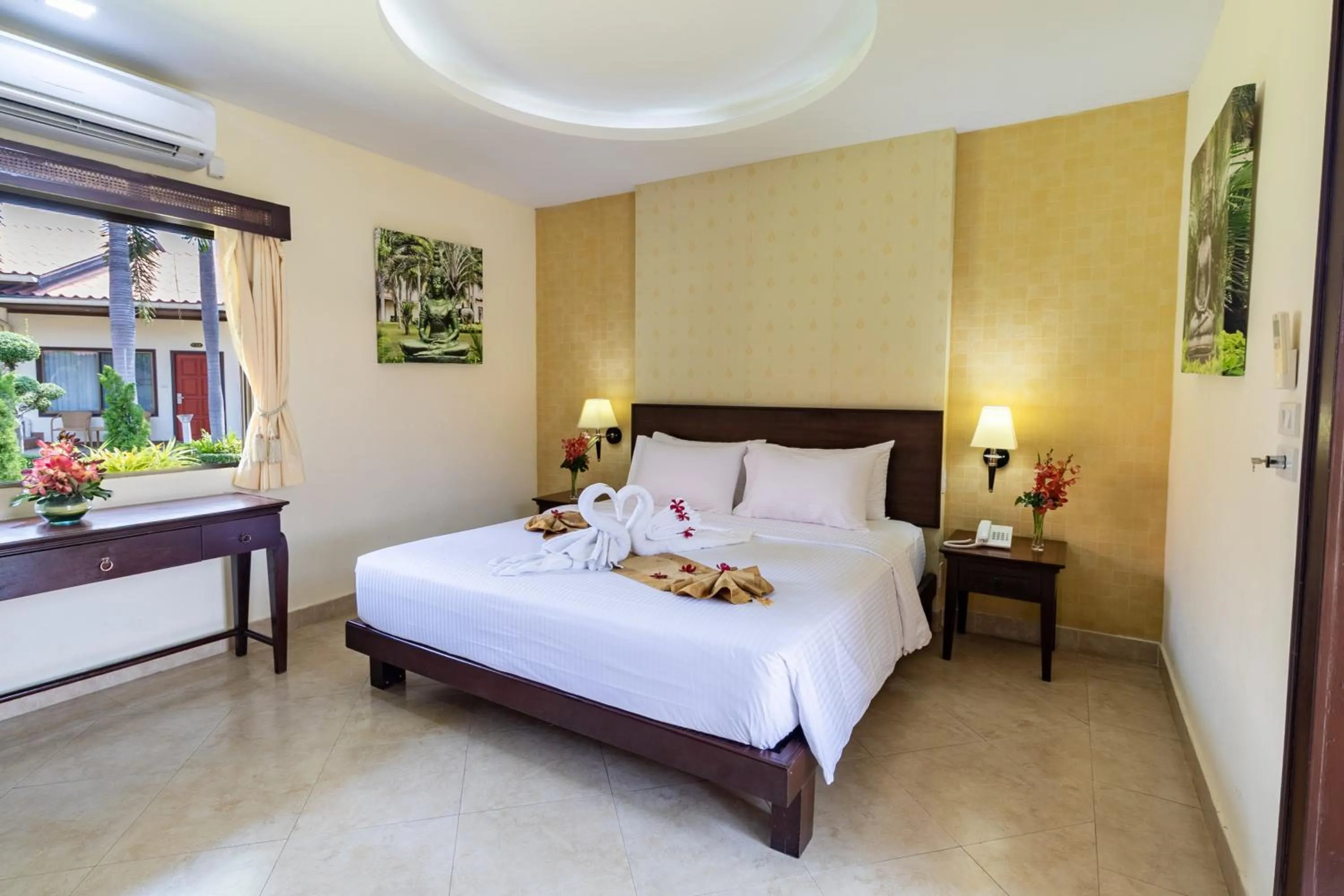 Bed in Thai Garden Resort