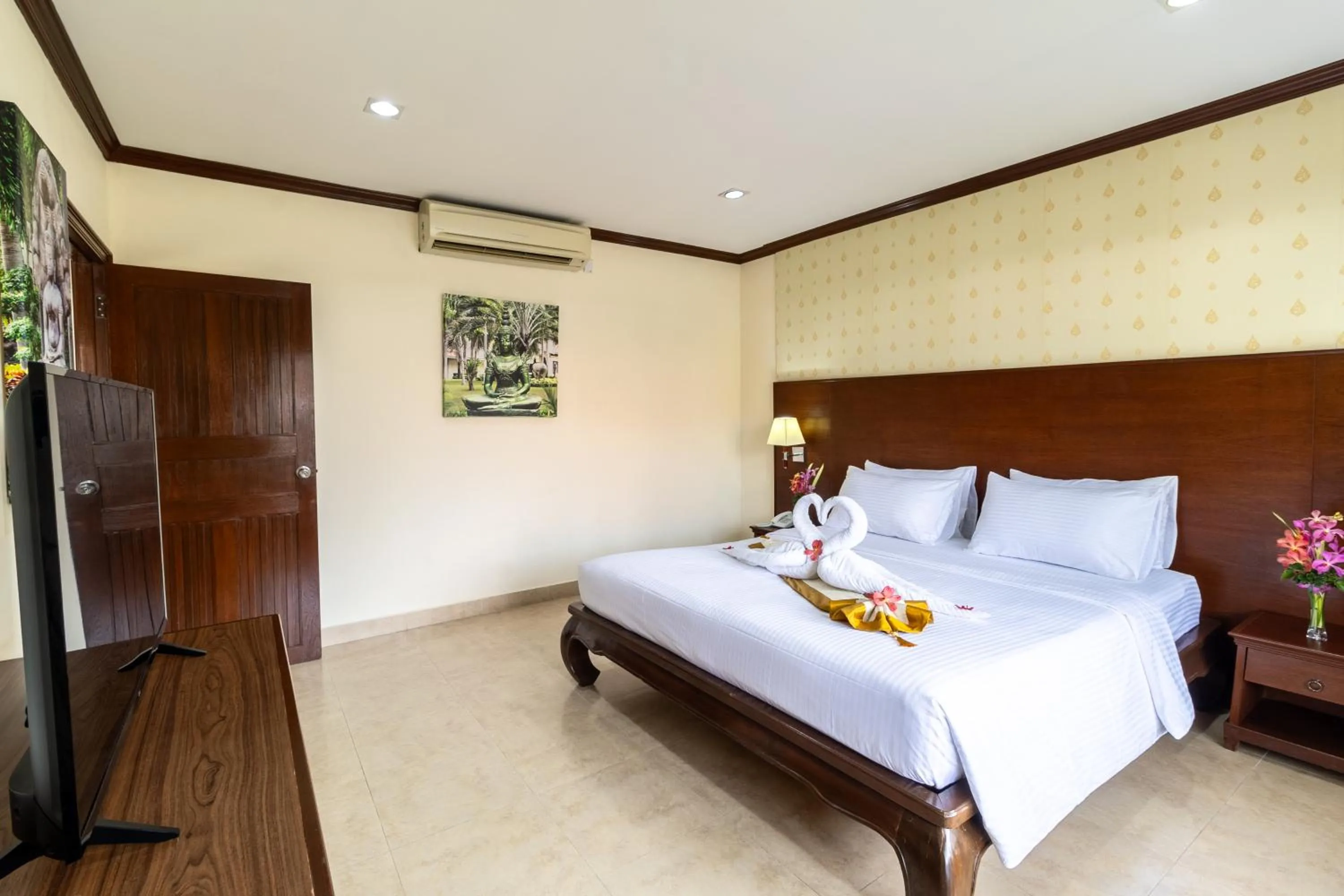 Bed in Thai Garden Resort