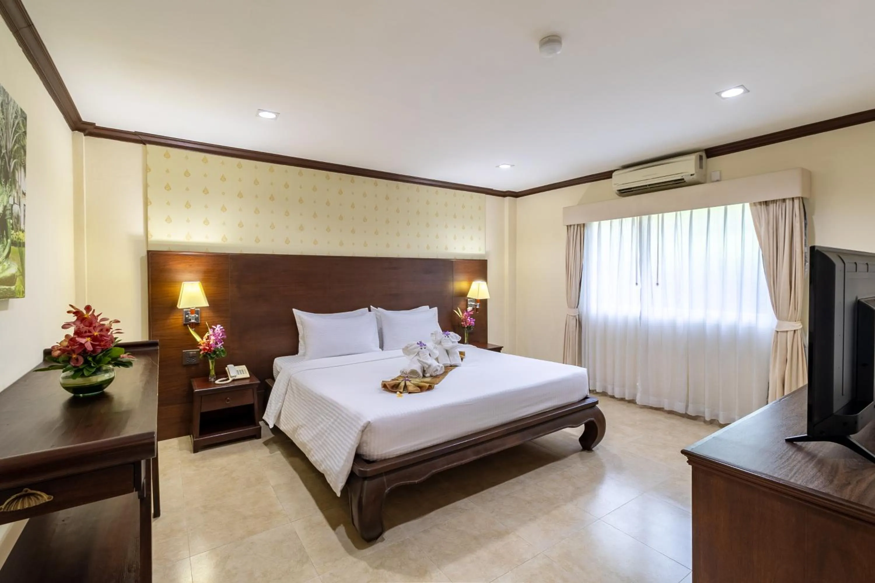 Bed in Thai Garden Resort