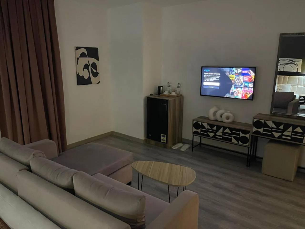 Communal lounge/ TV room in Elite Pyramids Boutique Hotel