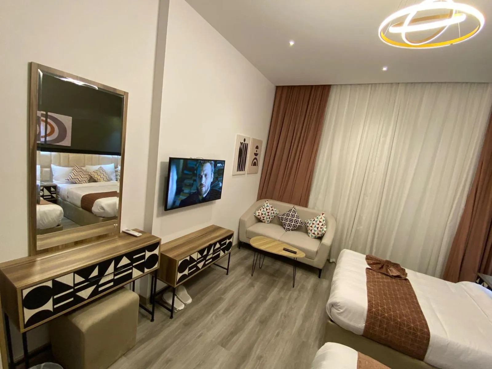 Communal lounge/ TV room, Bed in Elite Pyramids Boutique Hotel