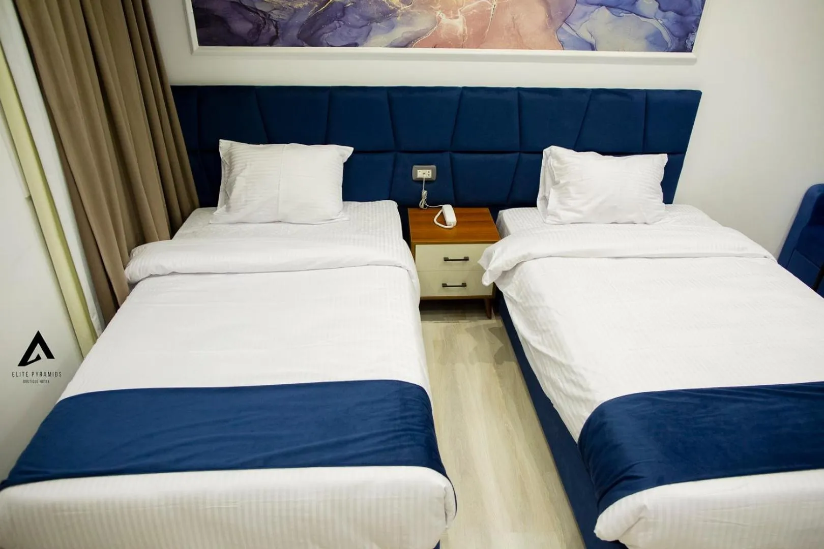 Bed in Elite Pyramids Boutique Hotel