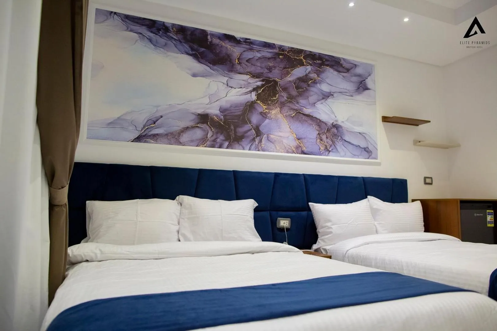 Bed in Elite Pyramids Boutique Hotel