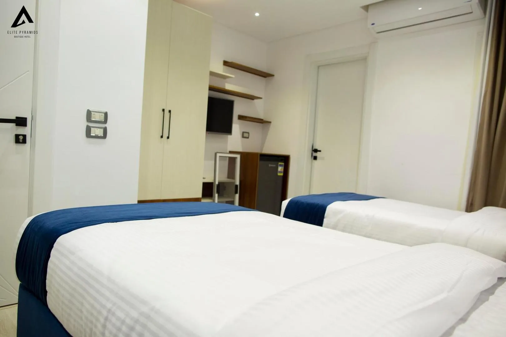 Bed in Elite Pyramids Boutique Hotel