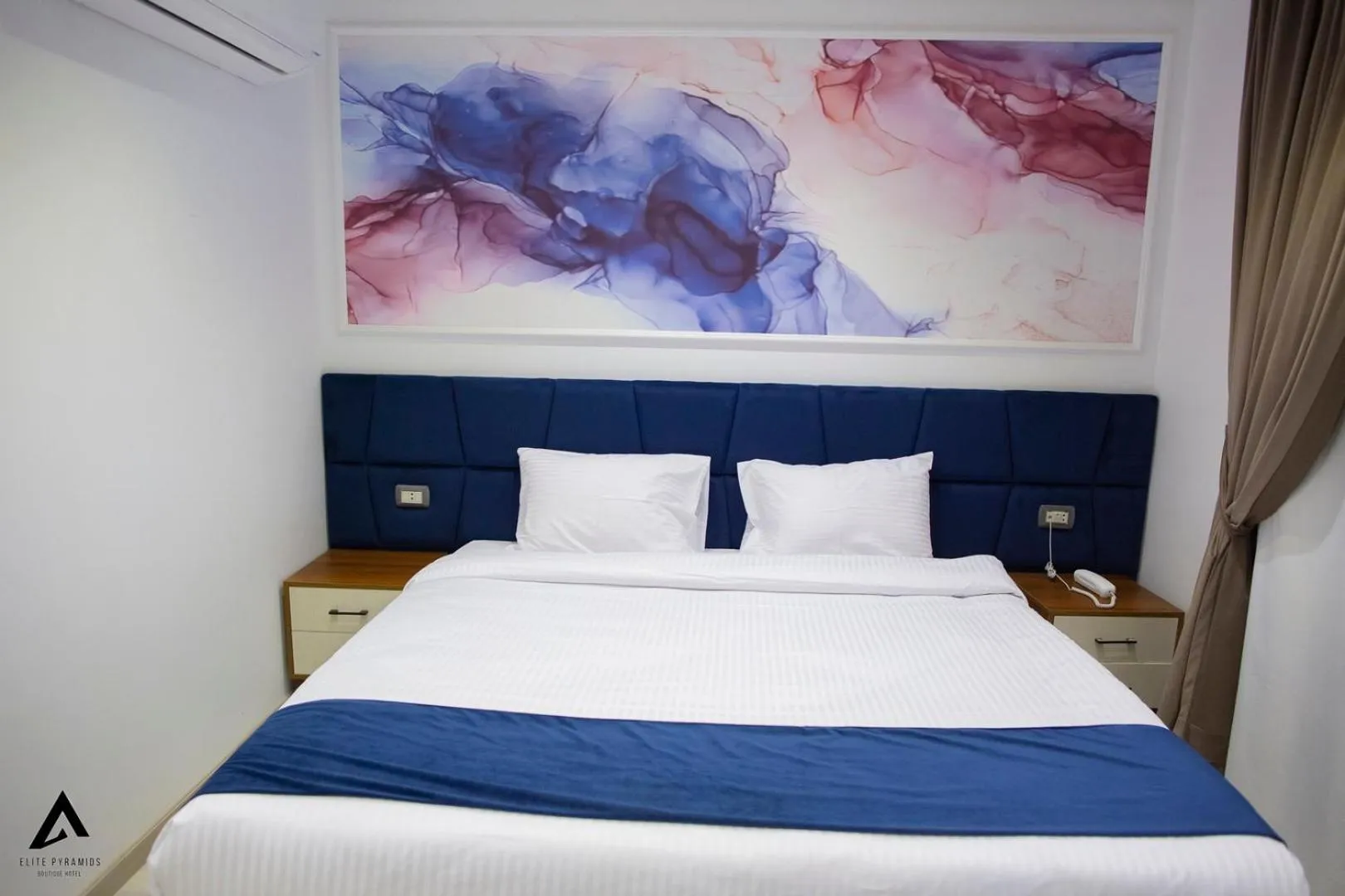 Bed in Elite Pyramids Boutique Hotel