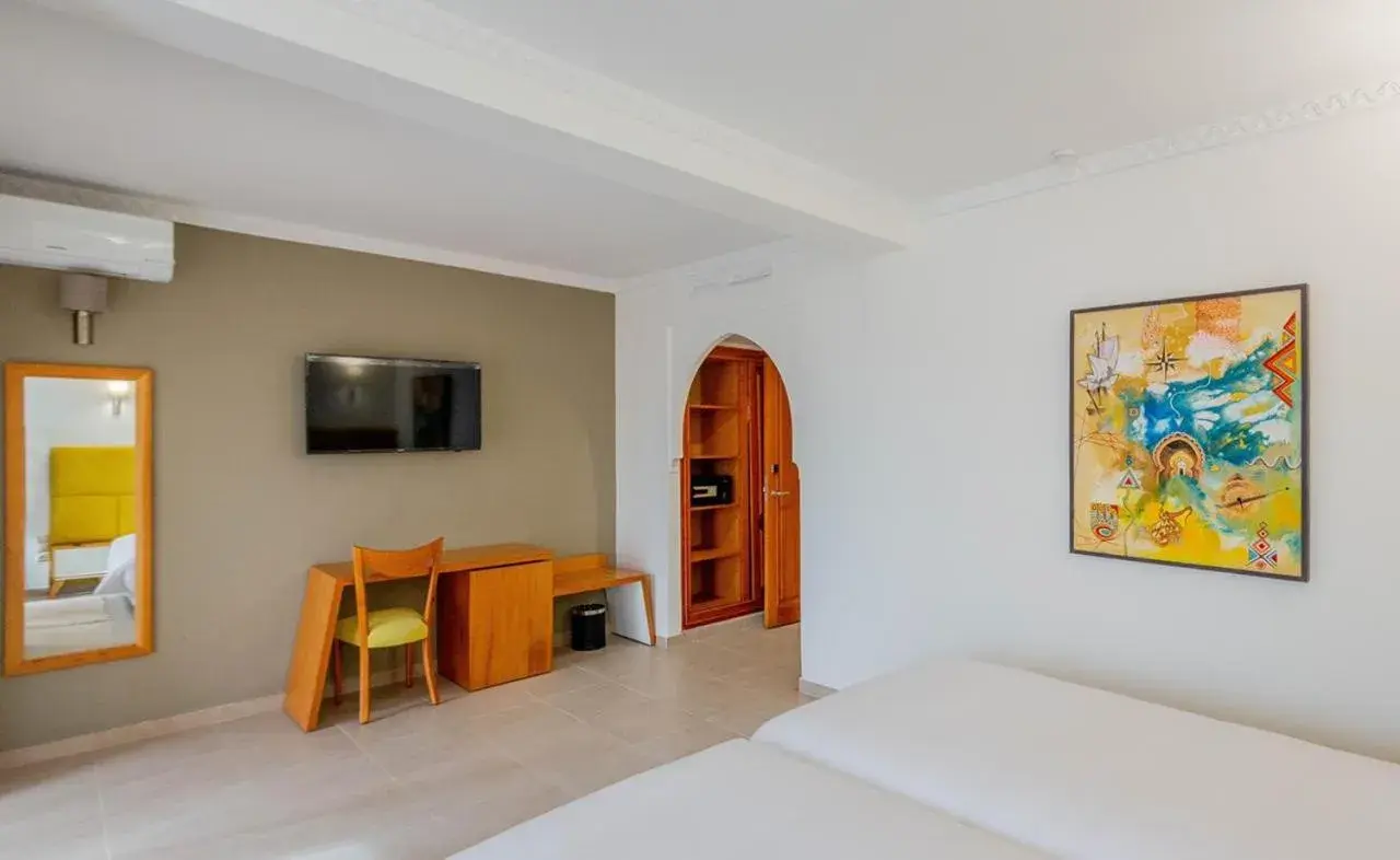 Bed in Hôtel Ibn Batouta Bed in Hôtel Ibn Batouta