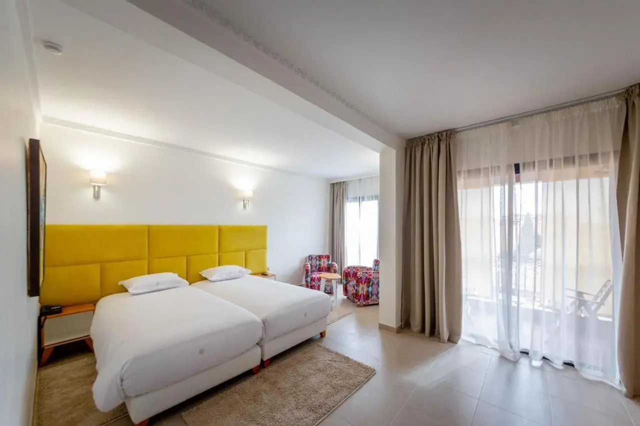 Bed in Hôtel Ibn Batouta Bed in Hôtel Ibn Batouta