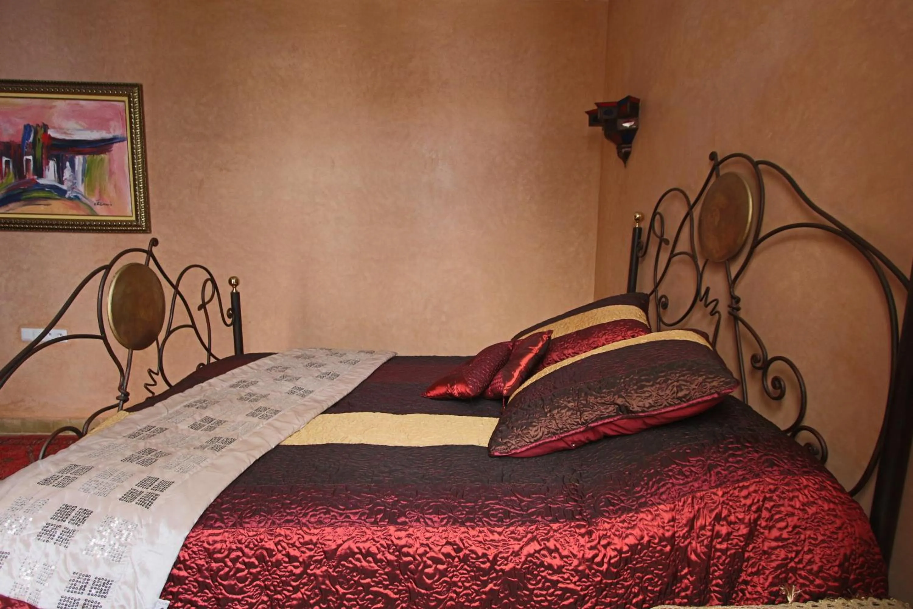 Bed in RIAD MAKENE MOUCHKILL