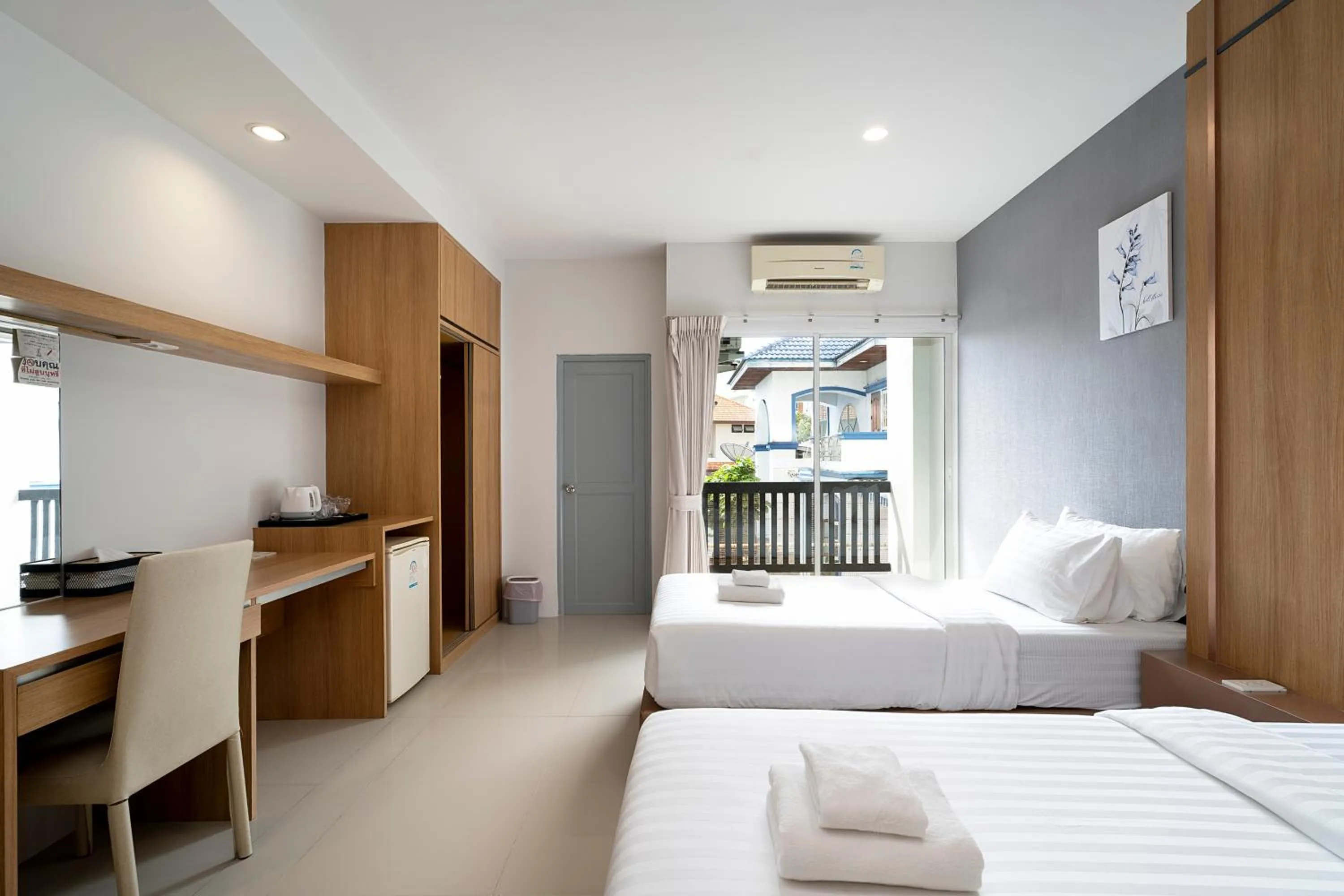 Bed in Riski Residence Ngamwongwan