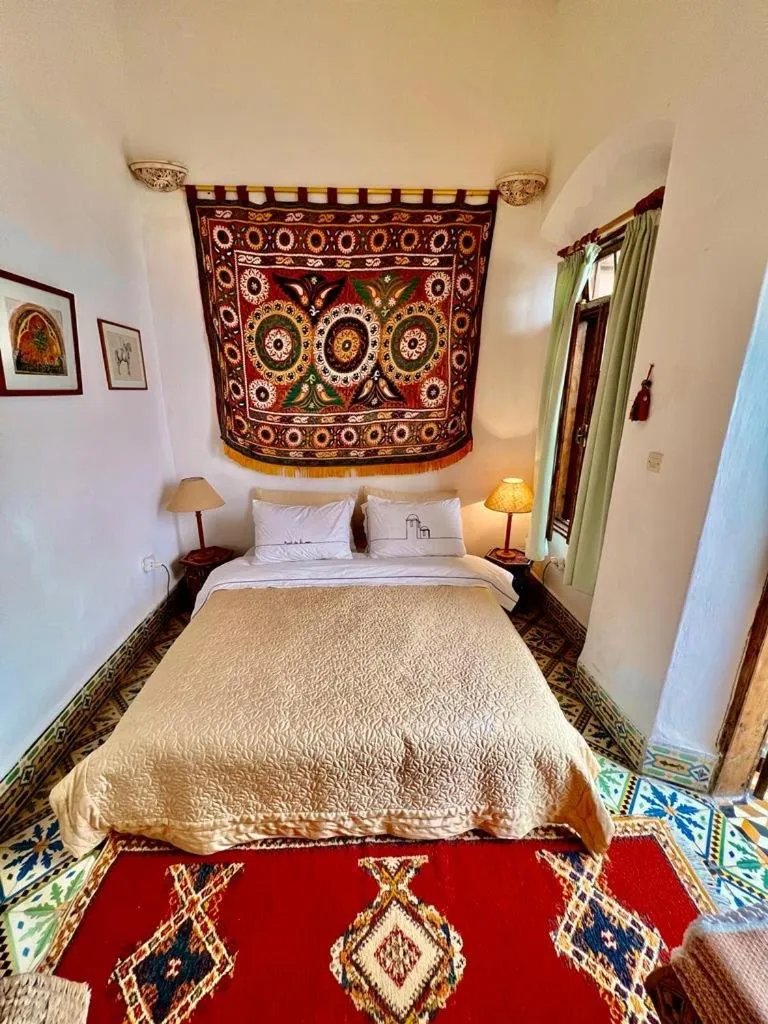 Bed in Riad De La Mer