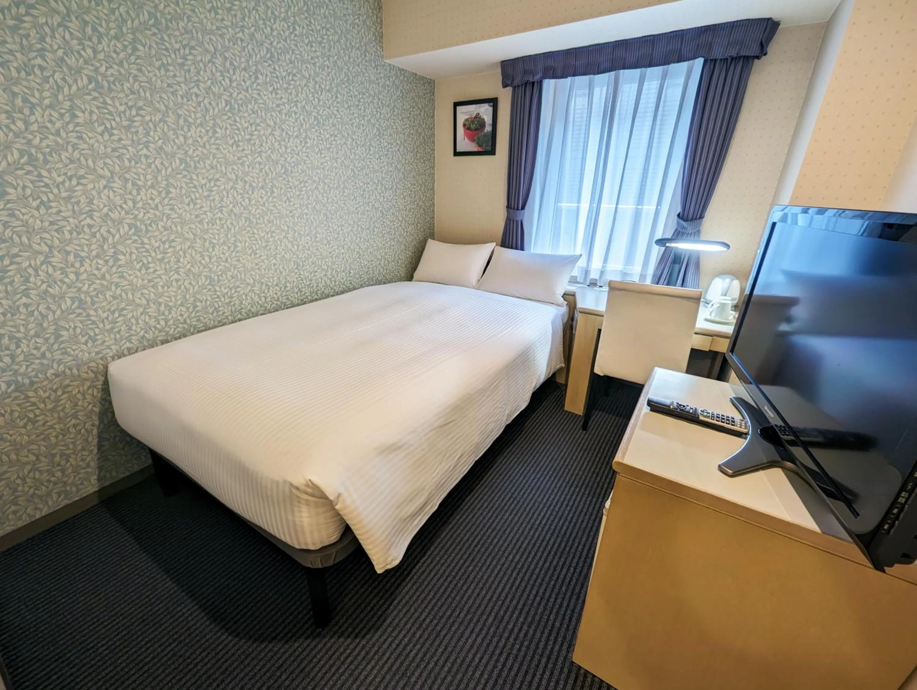 Bed in Shin-Yokohama Kokusai Hotel