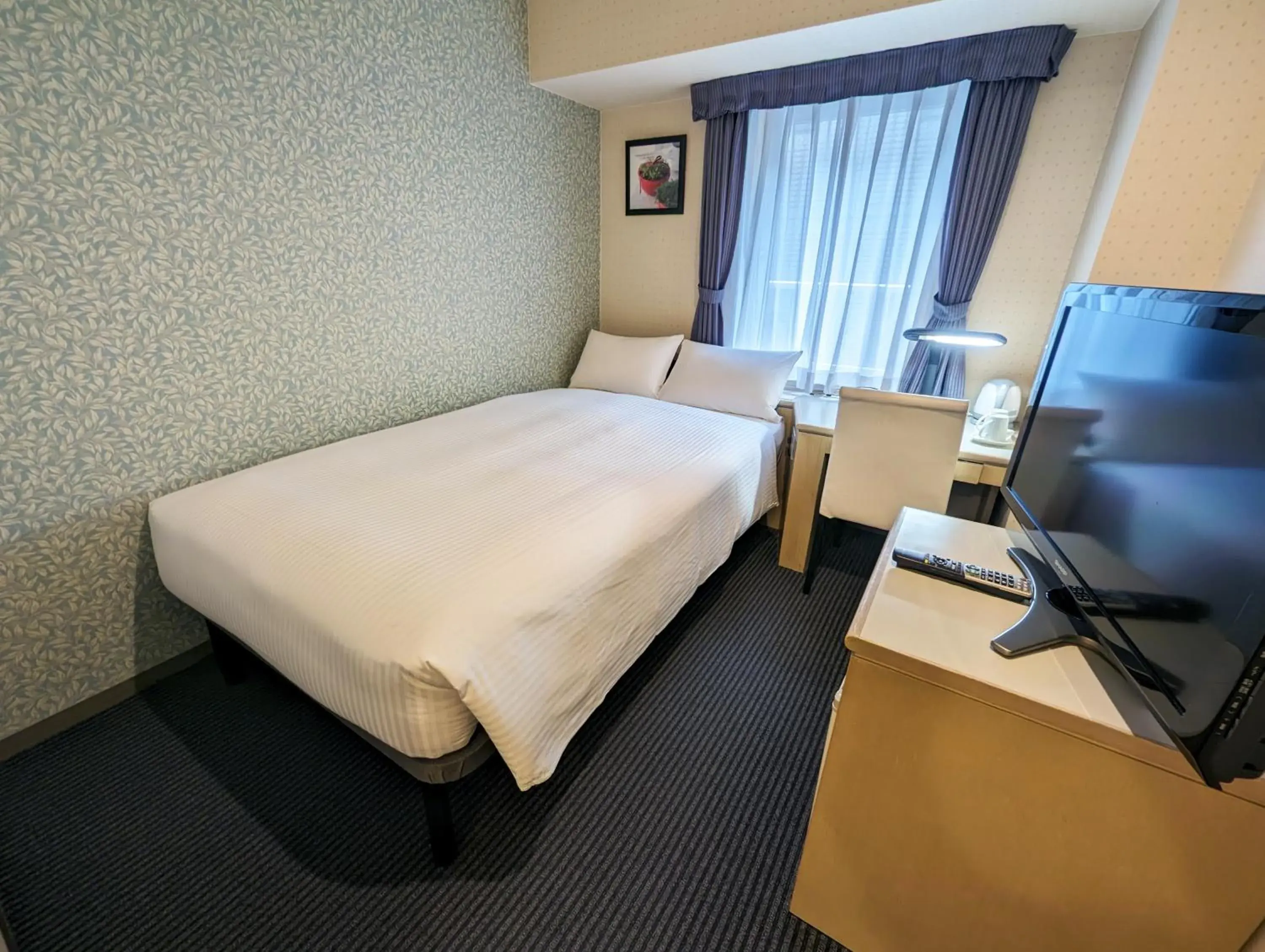 Bed in Shin-Yokohama Kokusai Hotel Bed in Shin-Yokohama Kokusai Hotel