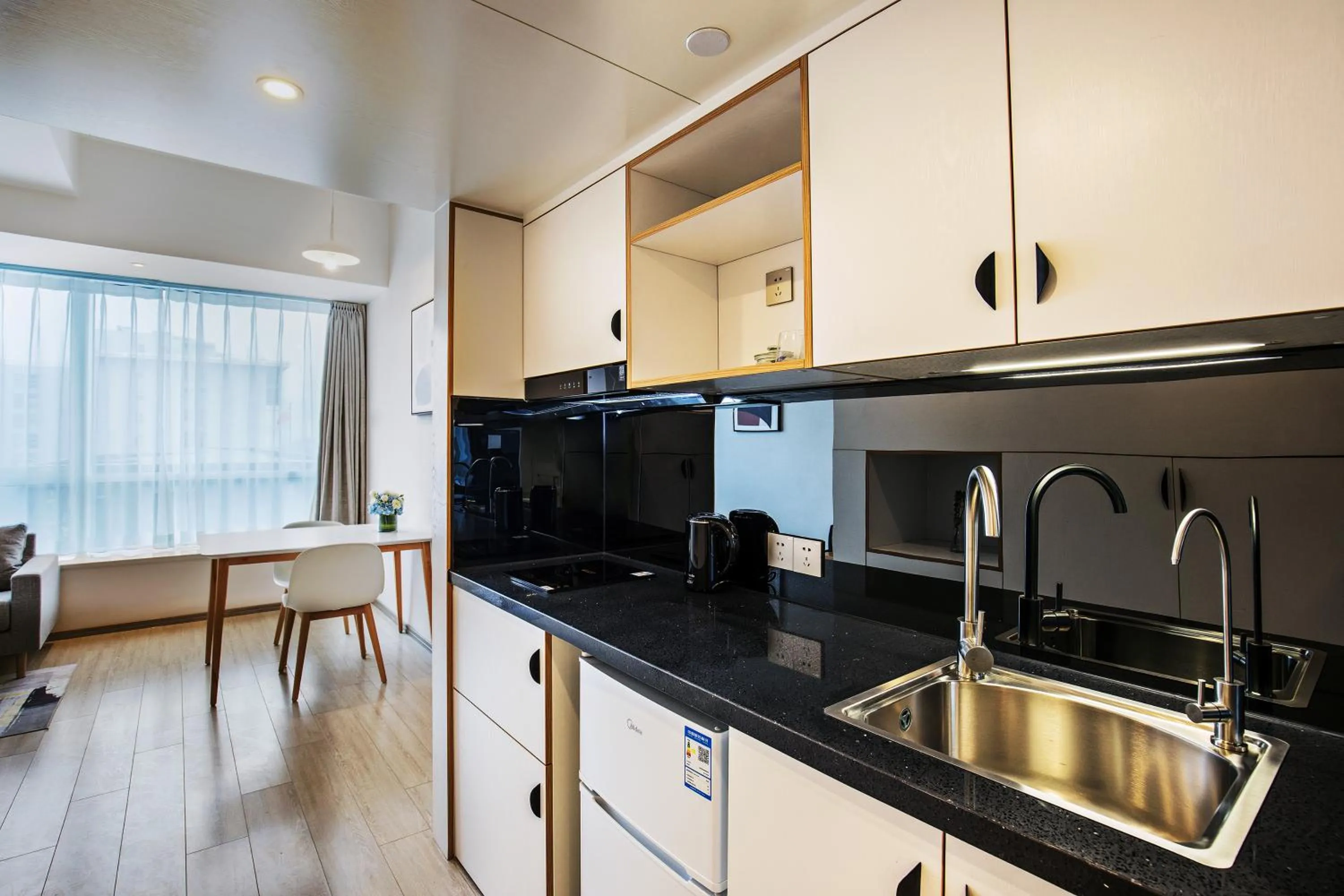 Kitchen or kitchenette in Livefortuna Hotel