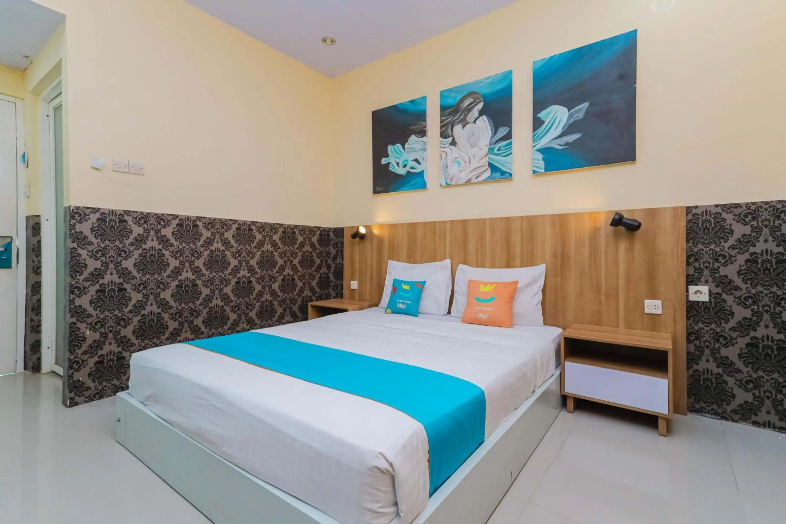 Bedroom, Bed in Sans Borobudur Homestay Banyuwangi Bedroom, Bed in Sans Borobudur Homestay Banyuwangi