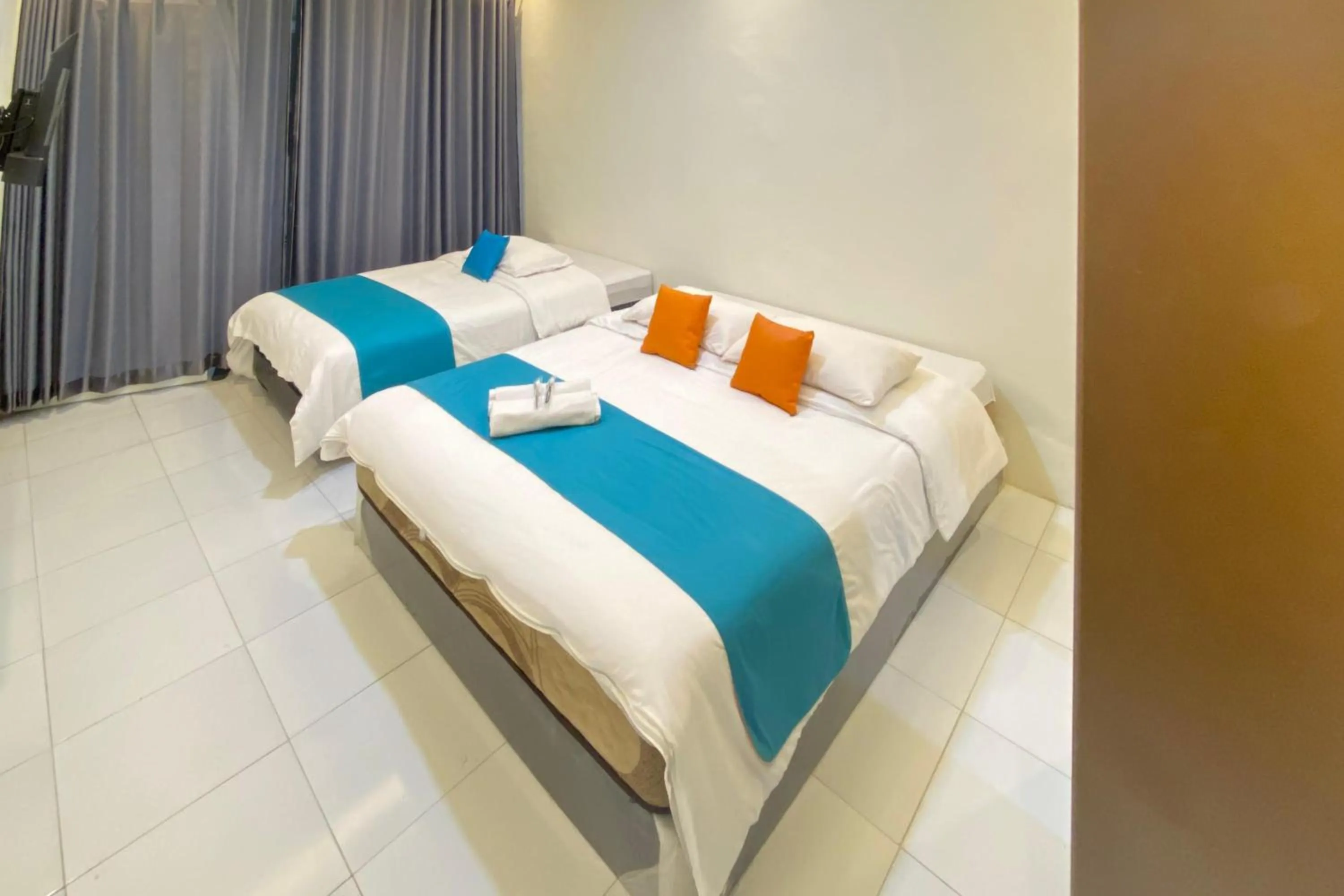 Bed in Sans Borobudur Homestay Banyuwangi