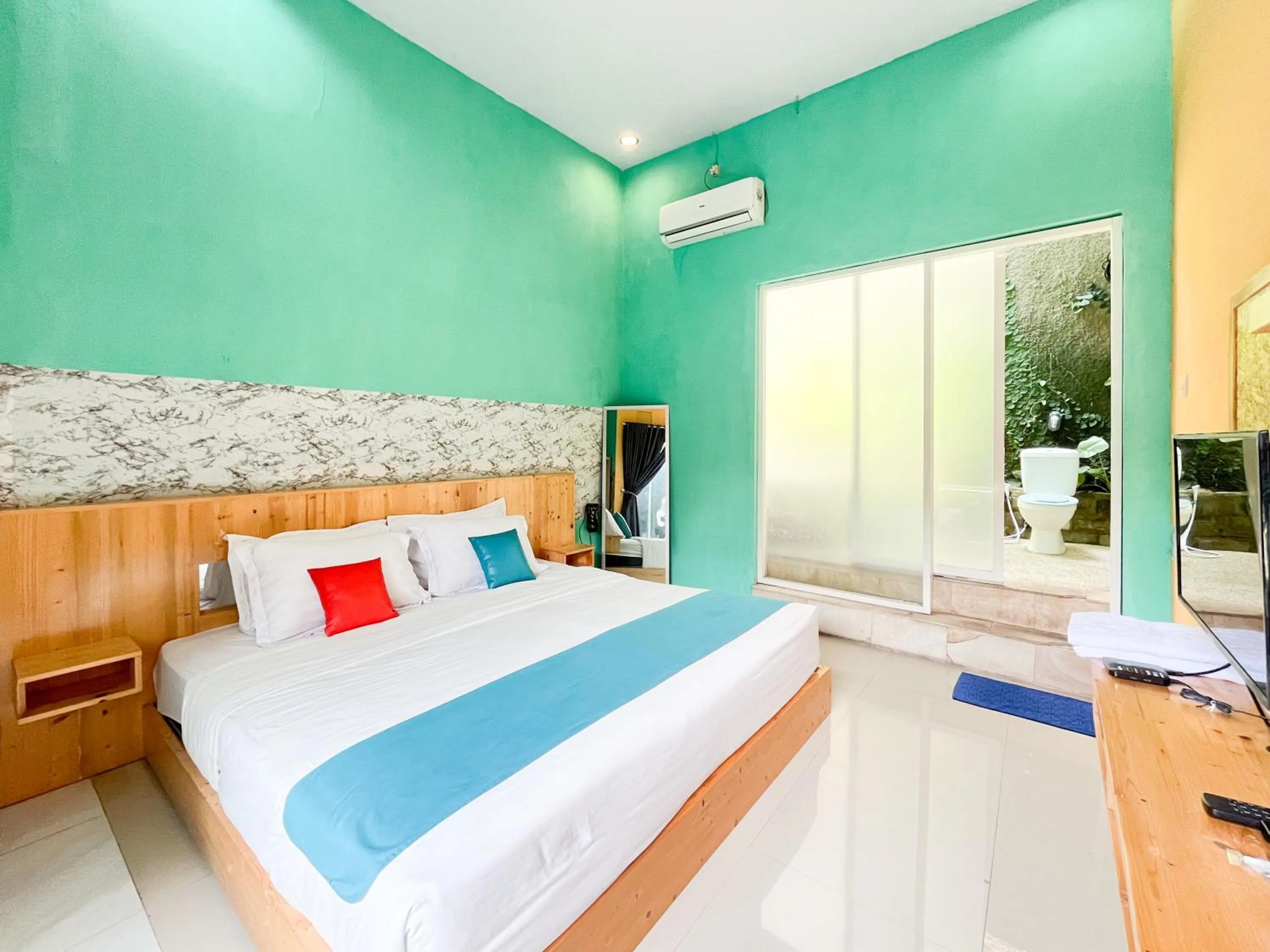 Bedroom, Bed in Sans Borobudur Homestay Banyuwangi