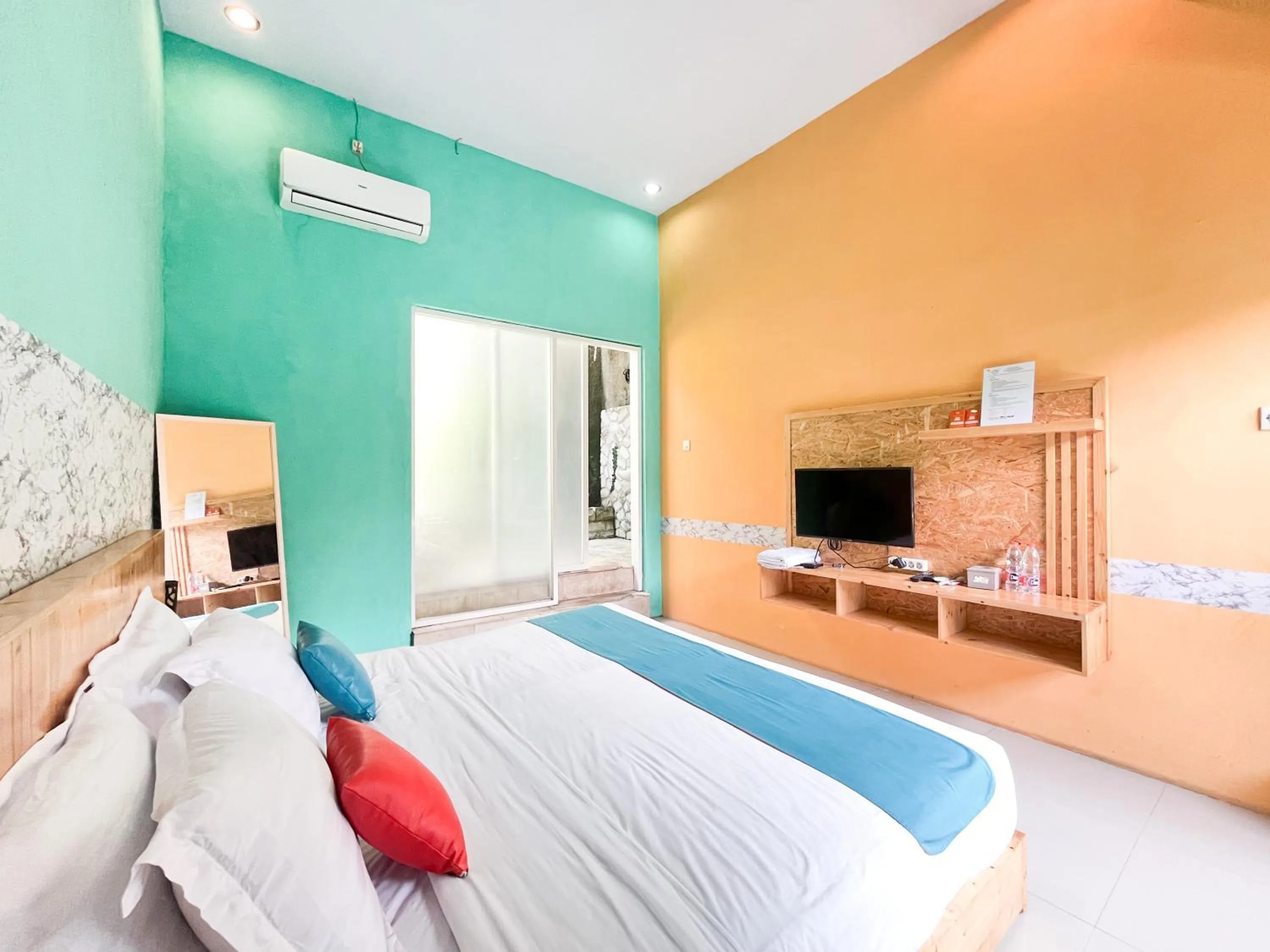 Bedroom, Bed in Sans Borobudur Homestay Banyuwangi