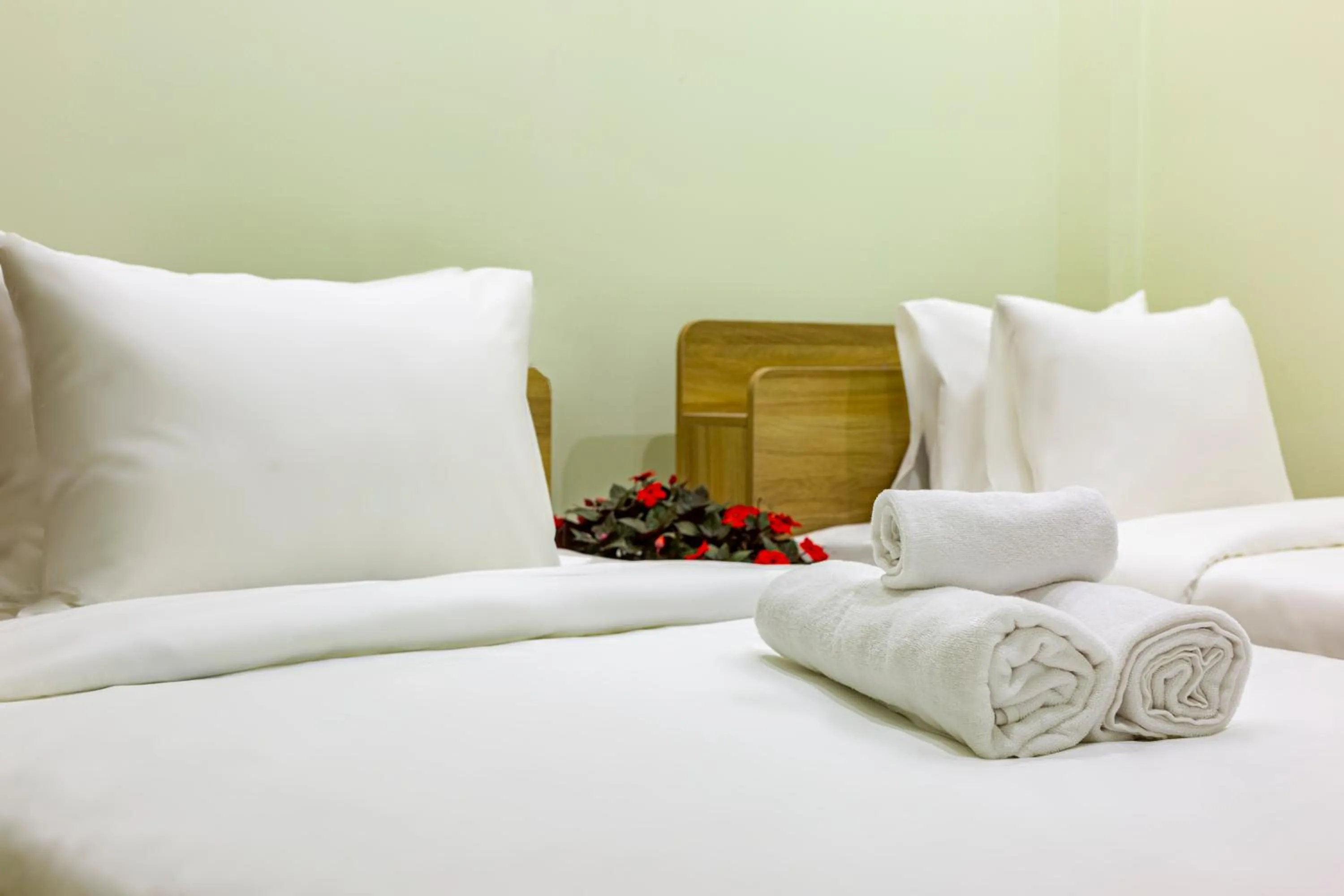 Bed in MANGO MANGO HOTEL & APARTMENT