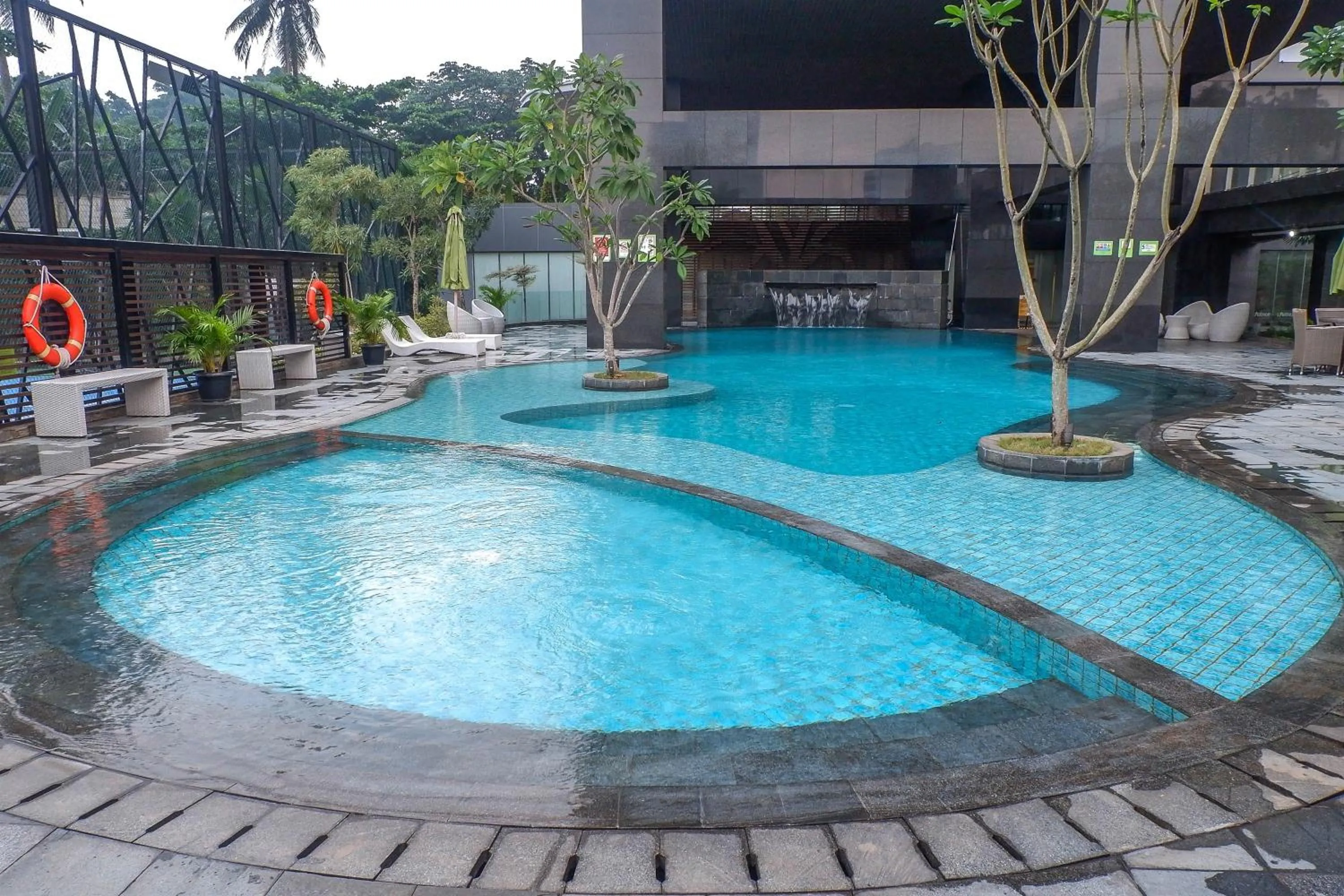Swimming pool in 2BR Pancoran L'Avenue Apartment Great Facility By Travelio