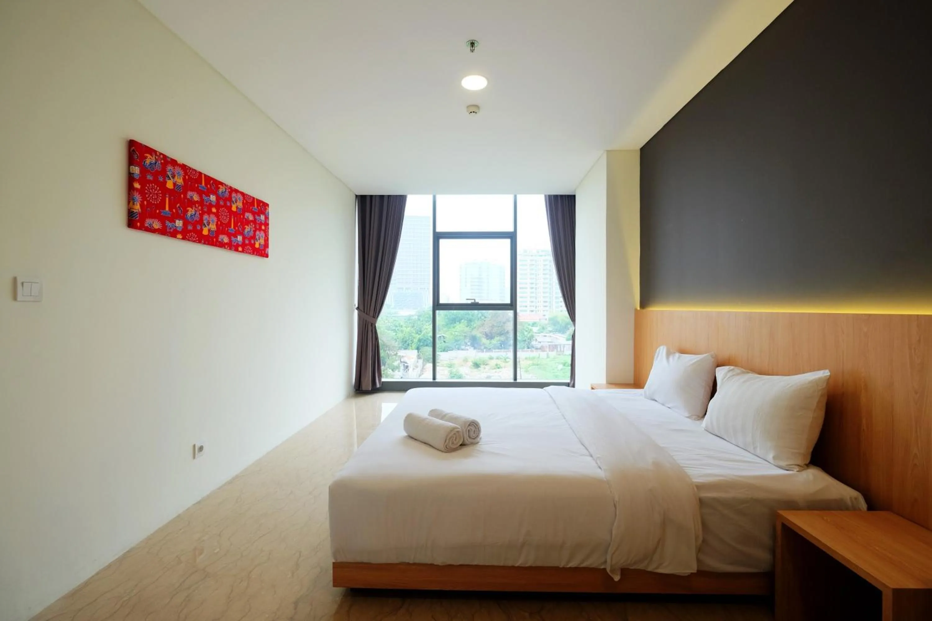 Bed in 2BR Pancoran L'Avenue Apartment Great Facility By Travelio