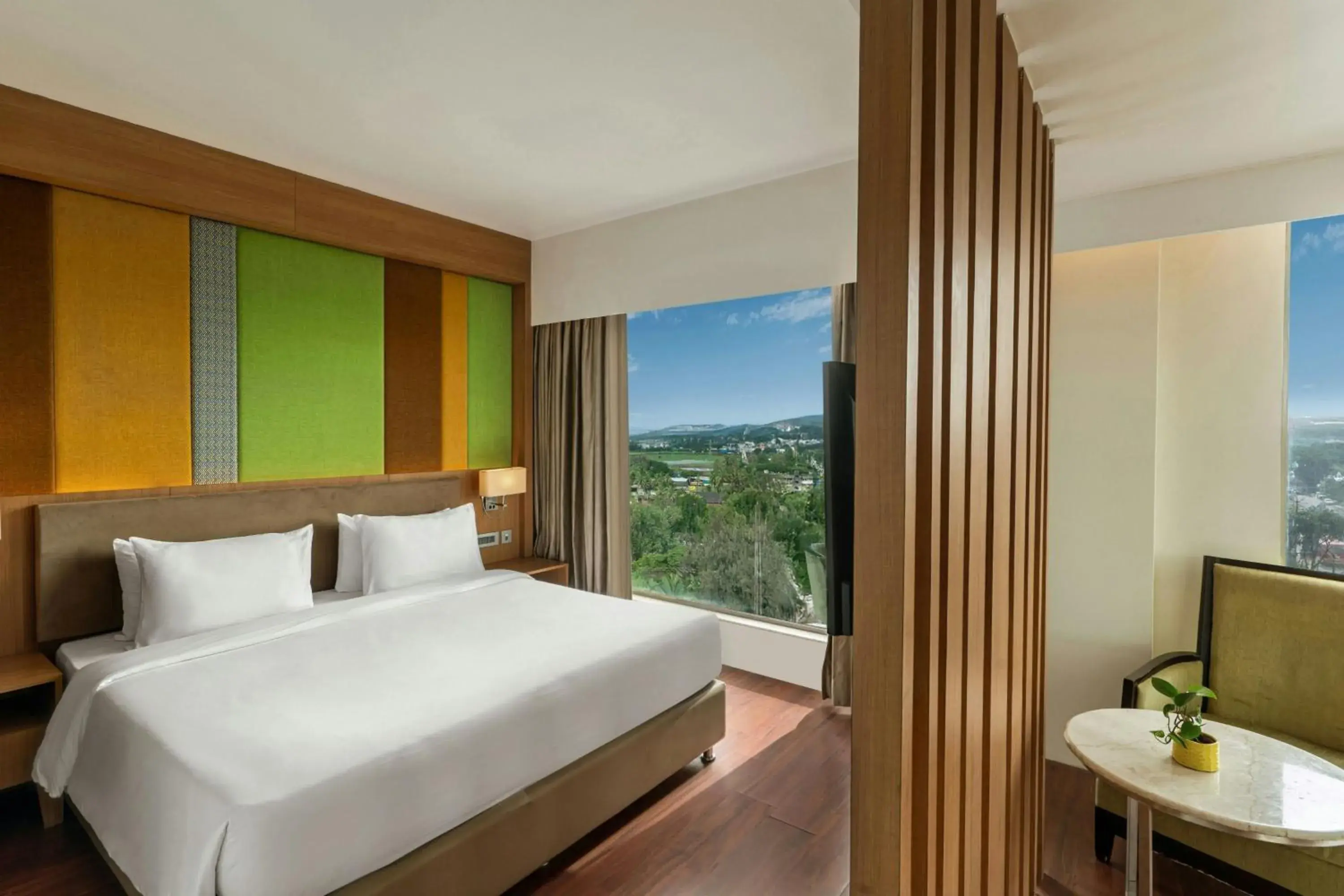 Photo of the whole room, Bed in The Fern, Kolhapur, Series by Marriott Photo of the whole room, Bed in The Fern, Kolhapur, Series by Marriott