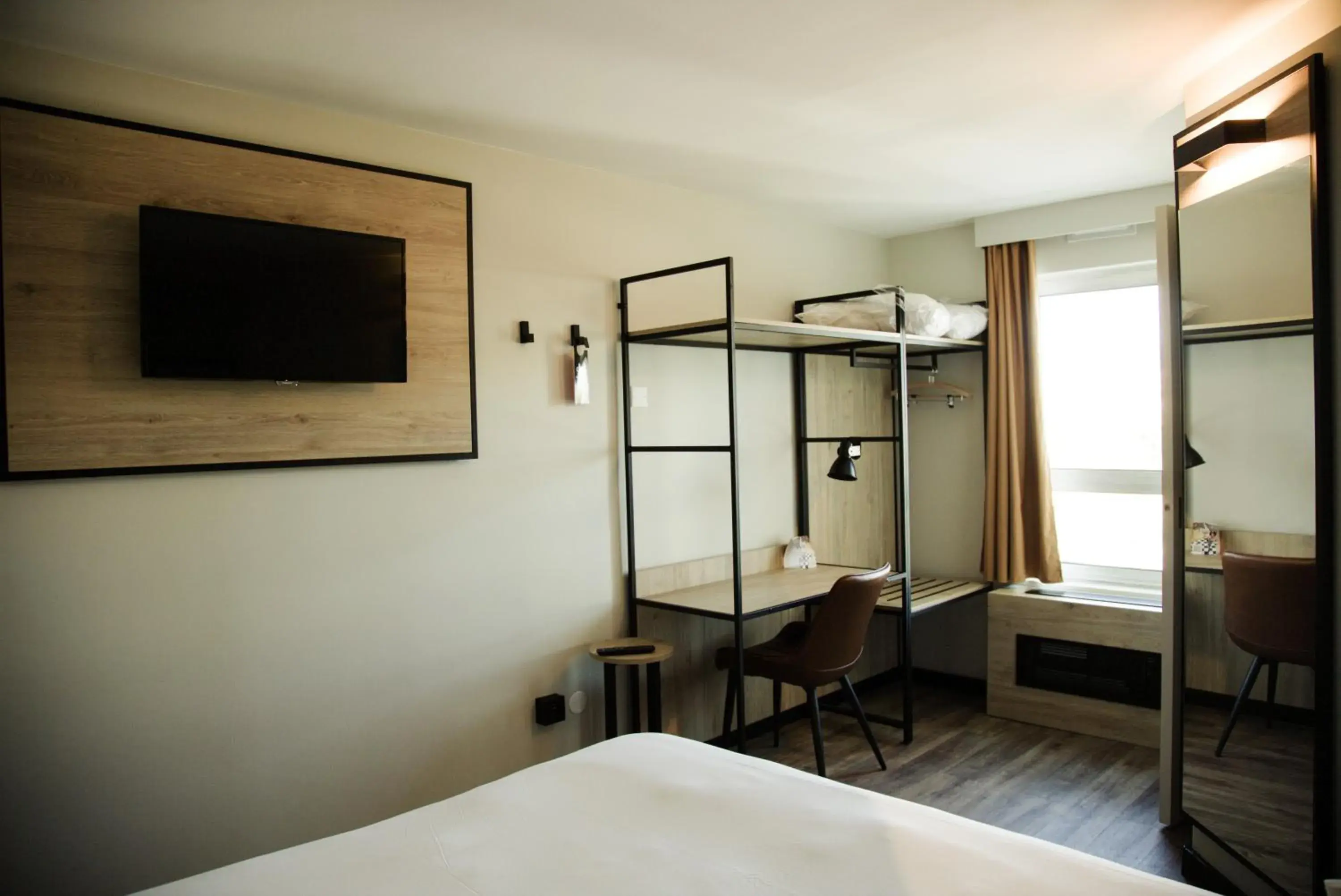 Photo of the whole room, Bed in ibis Clermont Ferrand Sud Herbet Photo of the whole room, Bed in ibis Clermont Ferrand Sud Herbet