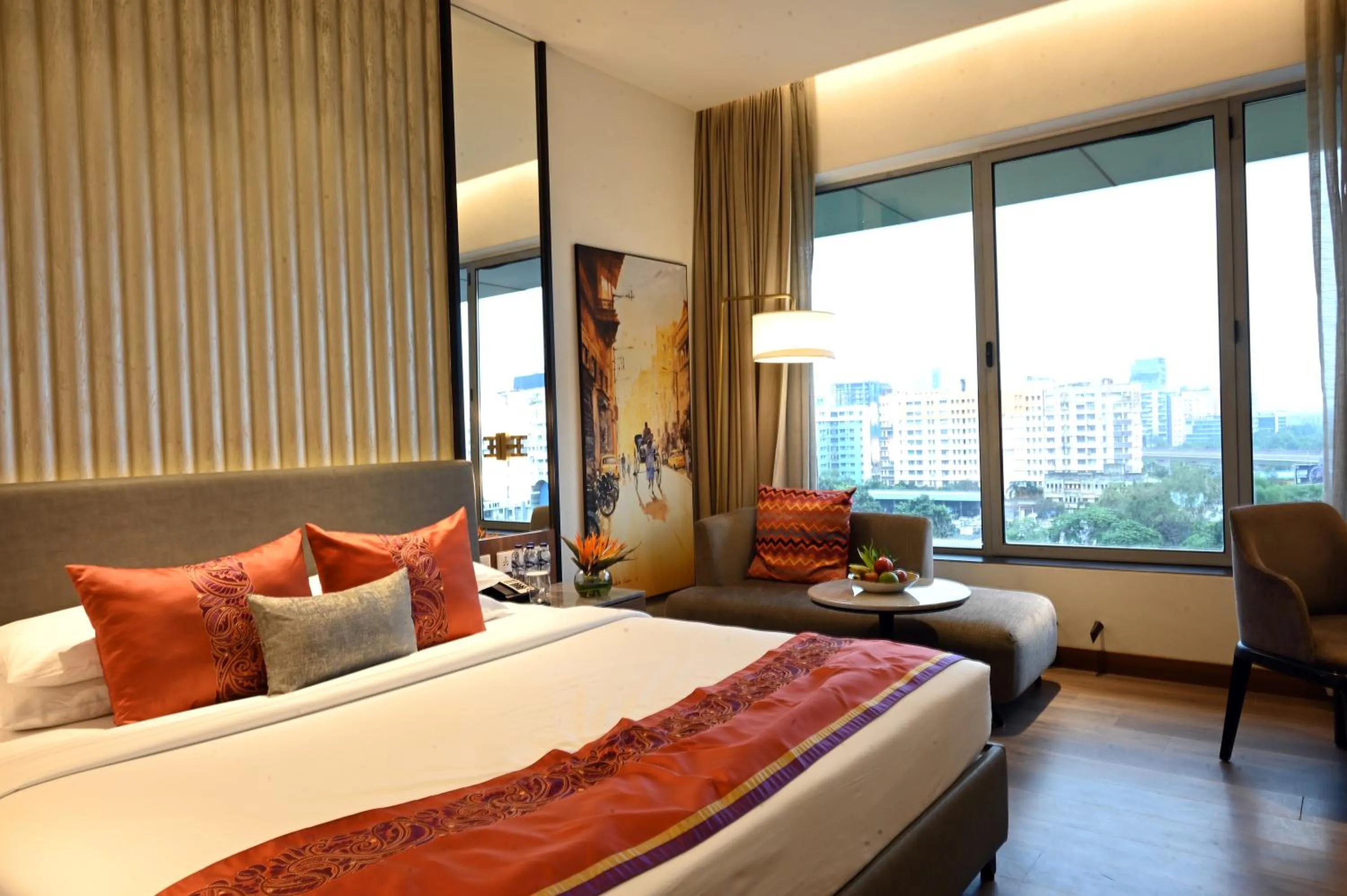 Photo of the whole room, Bed in Vivanta Kolkata EM Bypass